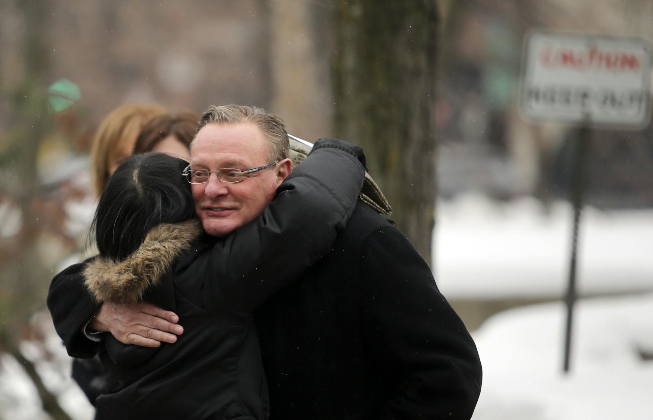 As Ted Mondale walked with family members to a reception at Orchestra Hall following services for his mother he got a hug from a well wisher. A service of Thanksgiving for Joan Adams Mondale was held at Westminster Presbyterian Church Saturday, Feb. 8, 2014, in Minneapolis, MN.