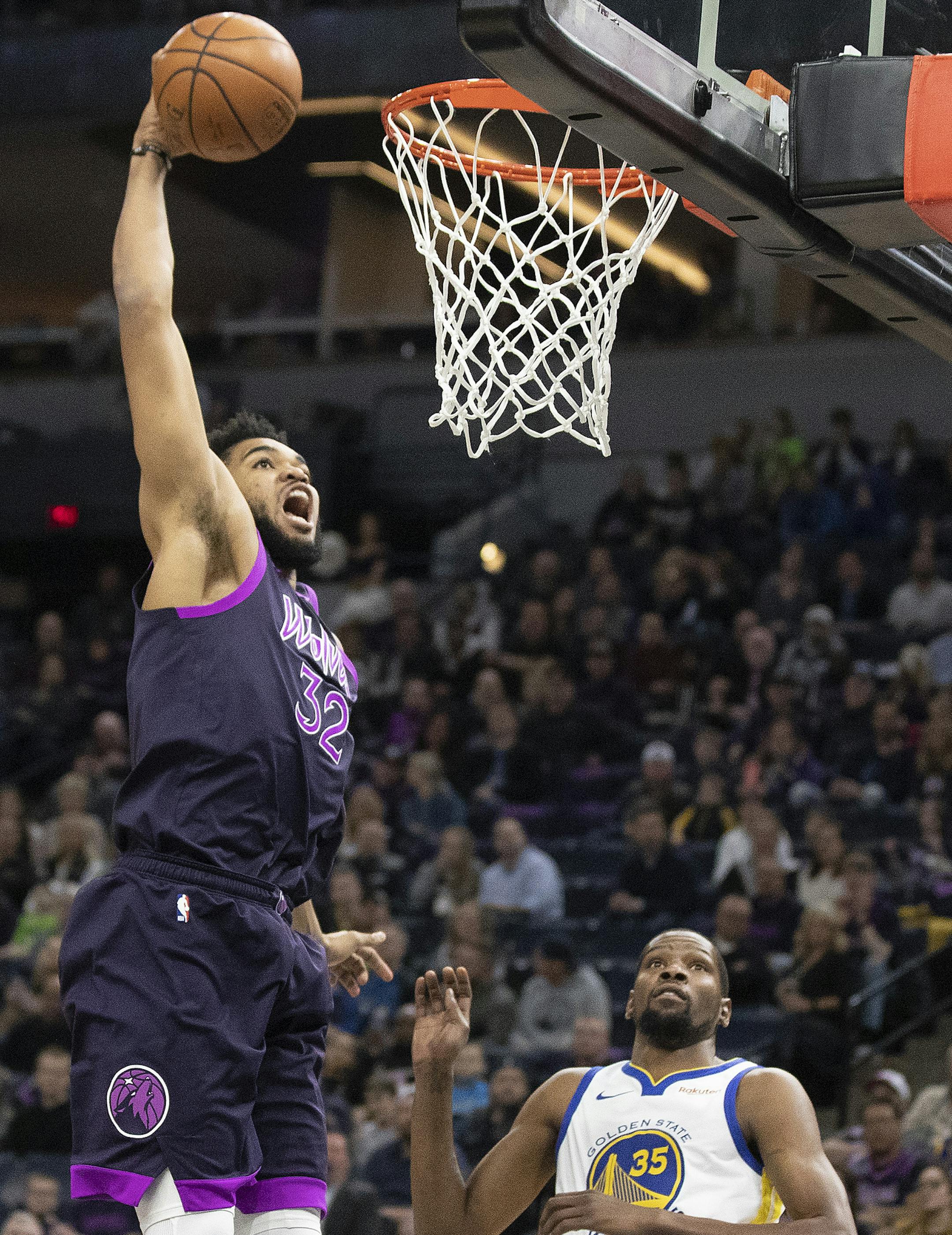 Wolves Karl-Anthony Towns dunked on Warriors Keven Durant at Target Center Tuesday March19, 2019 in Minneapolis,MN.] The Golden State Warriors played the Minnesota Timberwolves at Target Center .Jerry Holt &#x2022; Jerry.holt@startribune.com