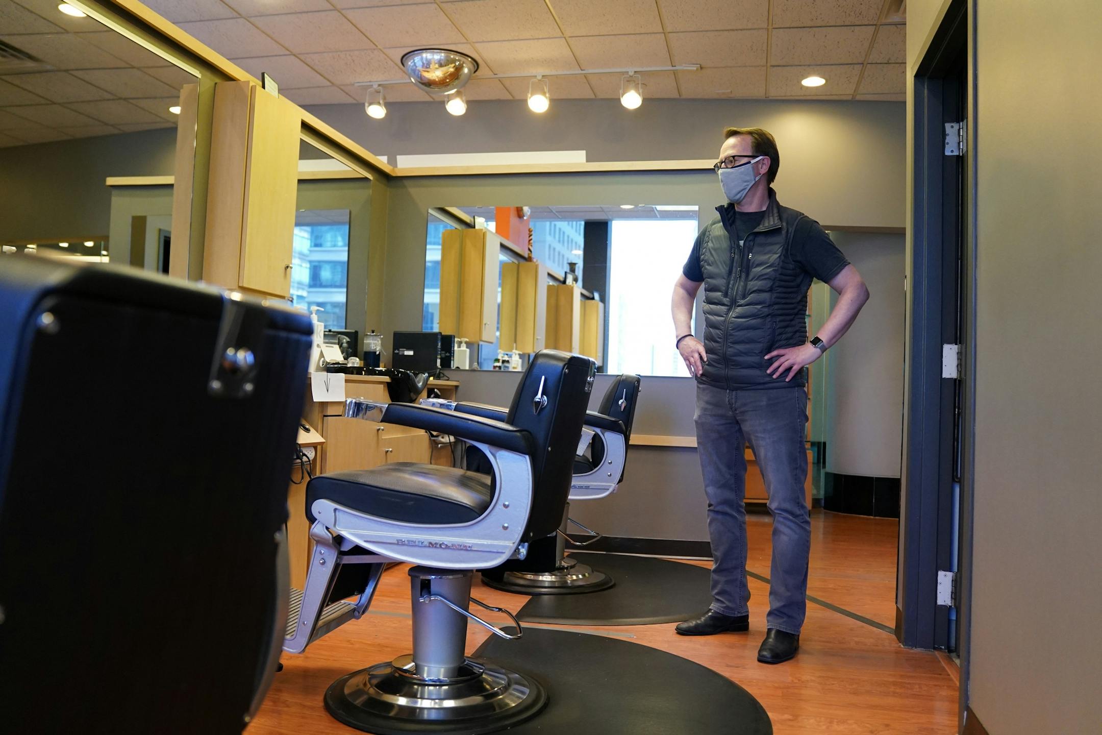 Tom Ford, owner of the Madison & Co Salon in the Canadian Pacific, building stopped in to get the mail and check in on the space Wednesday.