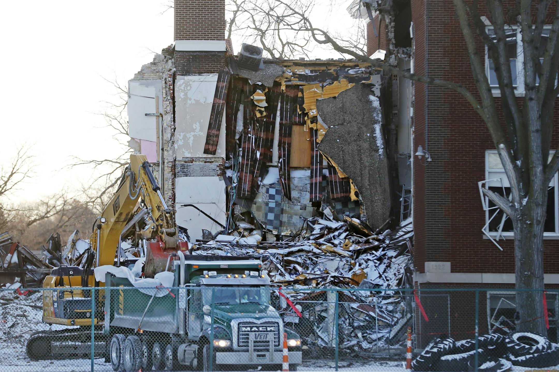 Construction crews begin demolition of the Minnehaha Academy campus damaged by a natural gas explosion. Over the next, two weeks, will be working to remove debris from the site.] Richard Tsong-Taatarii•rtsong-taatarii@startribune.com
