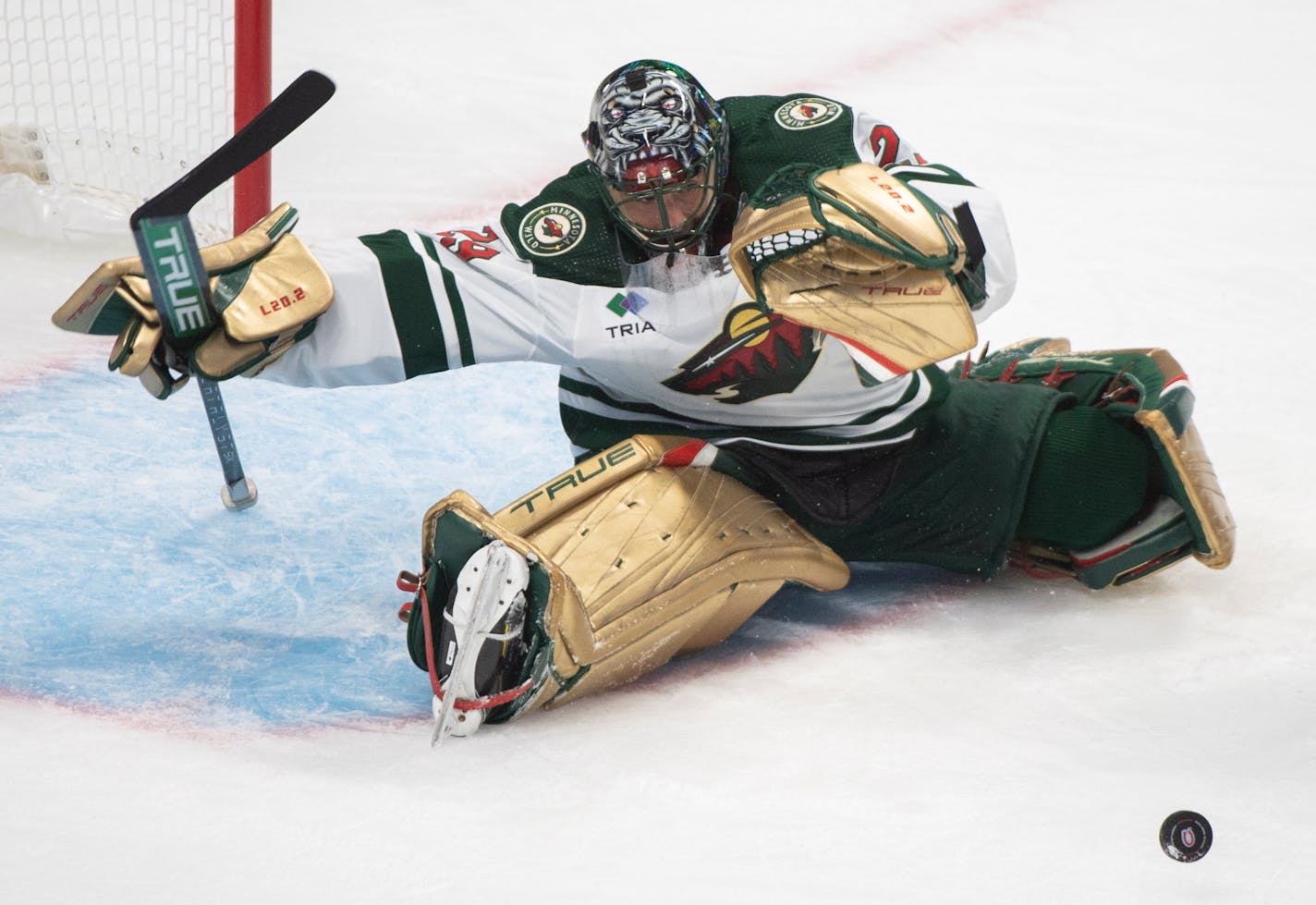 Minnesota Wild's goaltender Marc-Andre Fleury makes a save against the Montreal Canadiens during the first period of an NHL hockey game, Tuesday, Oct. 25, 2022 in Montreal. (Graham Hughes/The Canadian Press via AP)