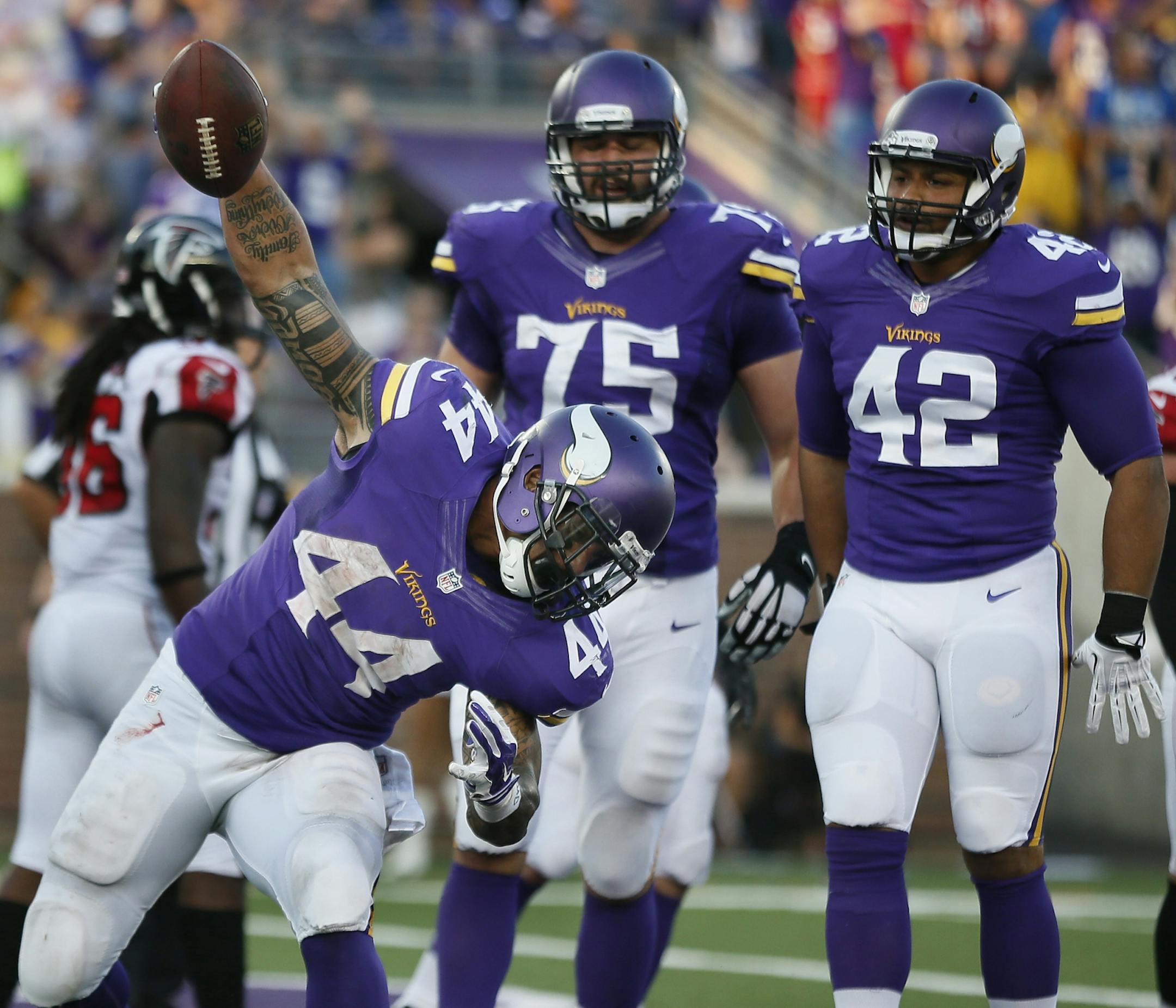 Minnesota Vikings running back Matt Asiata (44) celebrated his third touchdown of the game in forth quarter.The Minnesota Vikings played the Atlanta Falcons at TCF Bank Stadium Sunday September 28 , 2014 in Minneapolis ,MN.