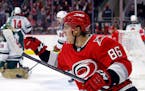 Carolina Hurricanes' Teuvo Teravainen (86) celebrates his goal against the Minnesota Wild during the second period of an NHL hockey game in Raleigh, N