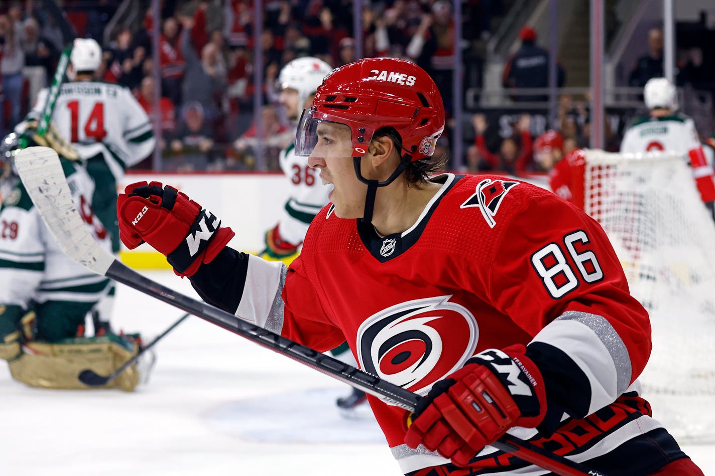 Carolina Hurricanes' Teuvo Teravainen (86) celebrates his goal against the Minnesota Wild during the second period of an NHL hockey game in Raleigh, N.C., Thursday, Jan. 19, 2023. (AP Photo/Karl B DeBlaker)