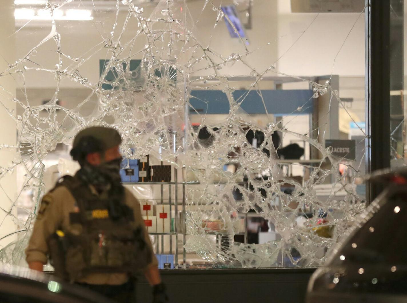 A broken window at Nordstrom Rack was among the unrest in downtown Minneapolis on Wednesday night.