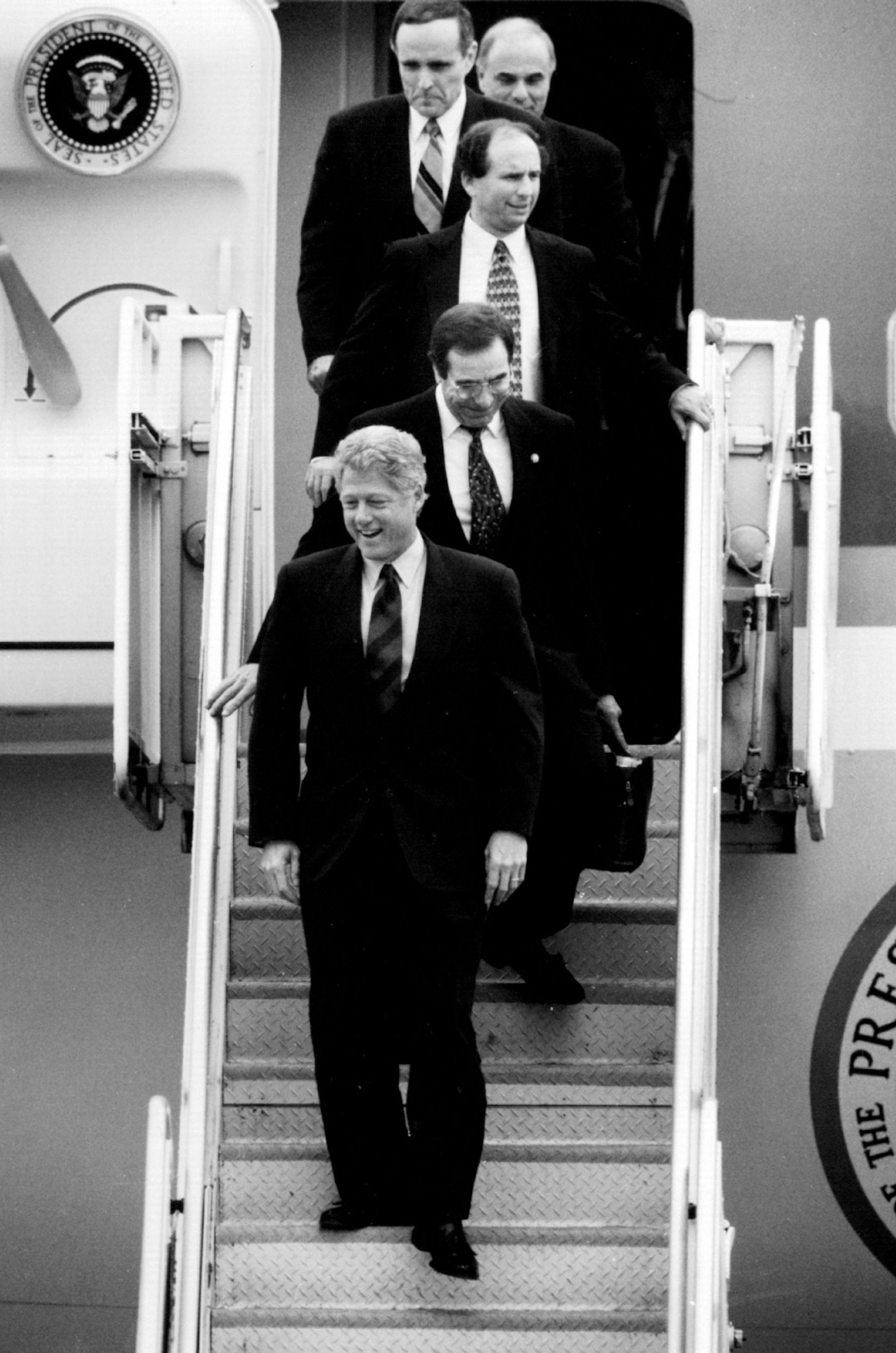 August 12, 1994: President Clinton emerged from Air Force One at 12:10 p.m. Friday followed by Representative Bruce Vento, Senator Paul Wellstone, New York Mayor Rudolph Giuliani and Philadelphia Mayor Edward Rendell.