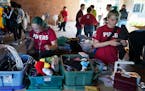 Hamline University students browsed through dorm items during the school's "free store" event outside Bush Memorial Library on Tuesday, Sept. 3, 2019.