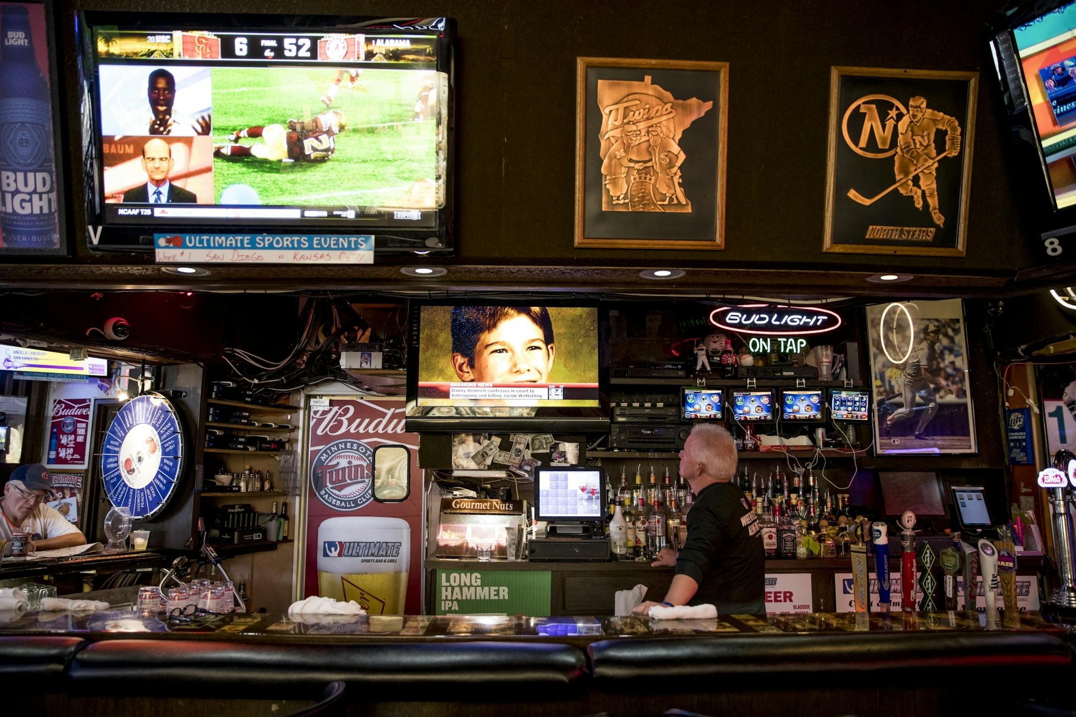 News of the confession of Danny Heinrich in the abudction and murder of Jacob Wetterling played on televisions at Ultimate Sports Bar and Grill in Waite Park, Minn. on Tuesday, September 6, 2016.