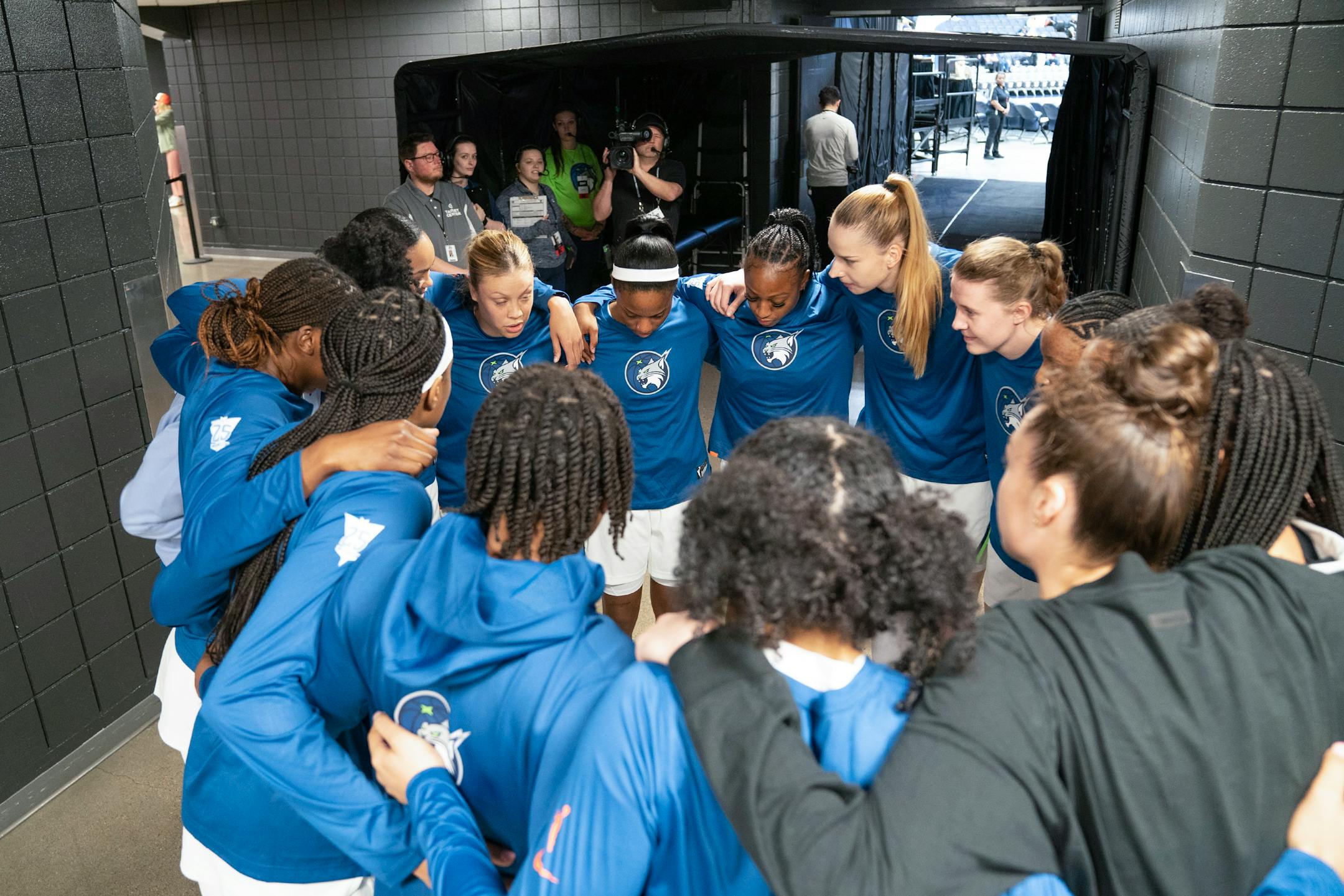 The Minnesota Lynx huddle in the tunnel ahead of their first preseason game against the Washington Mystics Friday, May 05, 2023, at Target Center in Minneapolis. ]