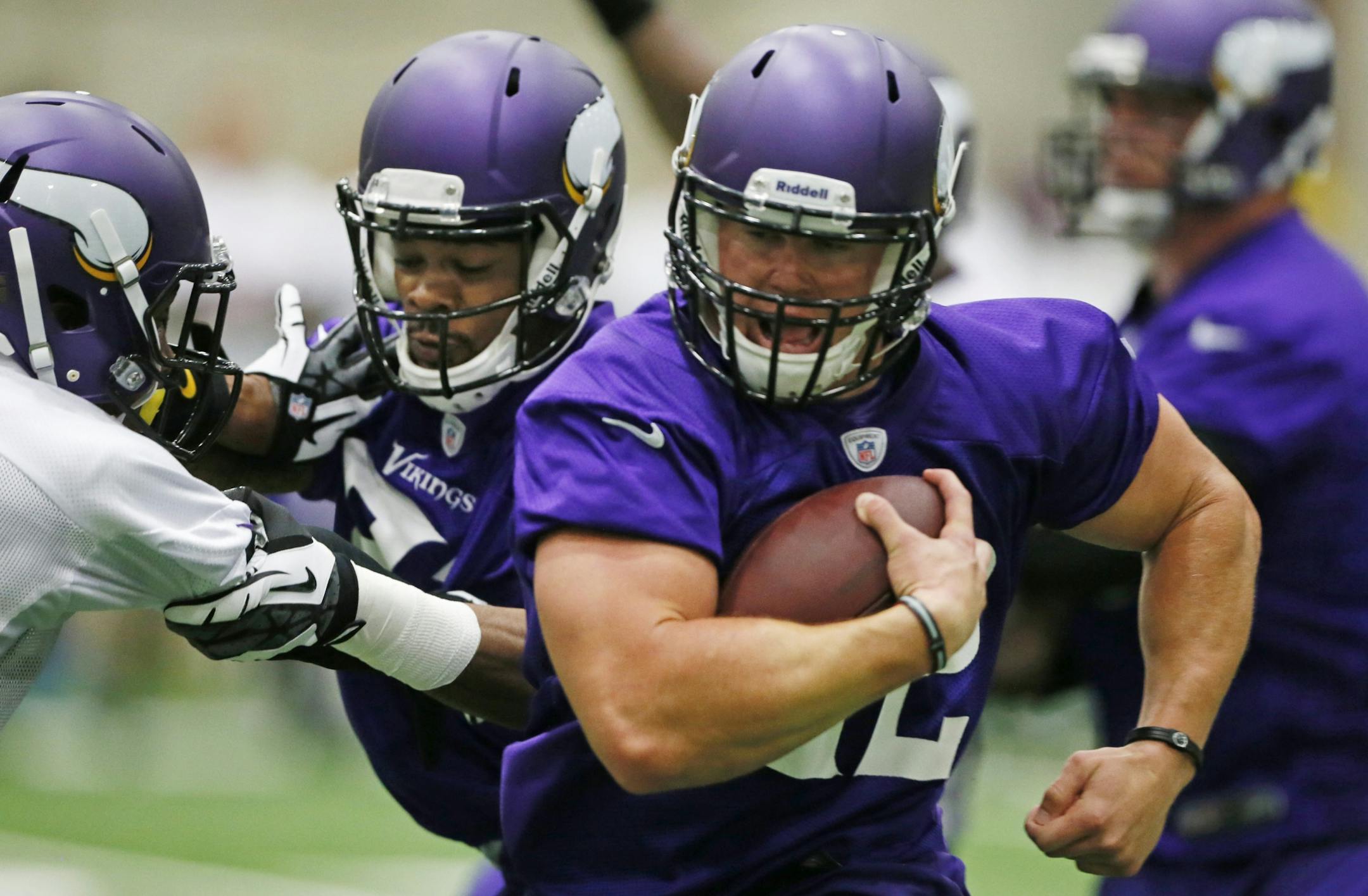 Toby Gerhart ran up the middle during Minnesota Vikings OTA practice June 5, 2013