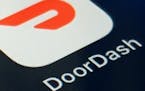 The DoorDash app is shown on a smartphone on Thursday, Feb. 27, 2020 in New York. The food delivery giant has taken a first formal step toward a stock