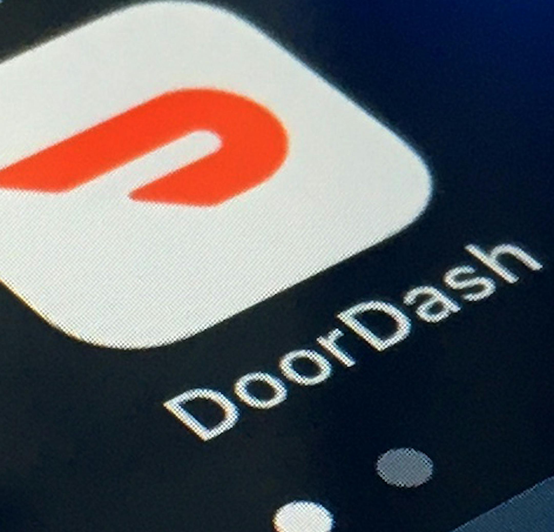 The DoorDash app is shown on a smartphone on Thursday, Feb. 27, 2020 in New York. The food delivery giant has taken a first formal step toward a stock market debut. The company announced Thursday that is has confidentially filed a draft S-1 form with the Securities Exchange Commission related to a public stock offering. (AP Photo)