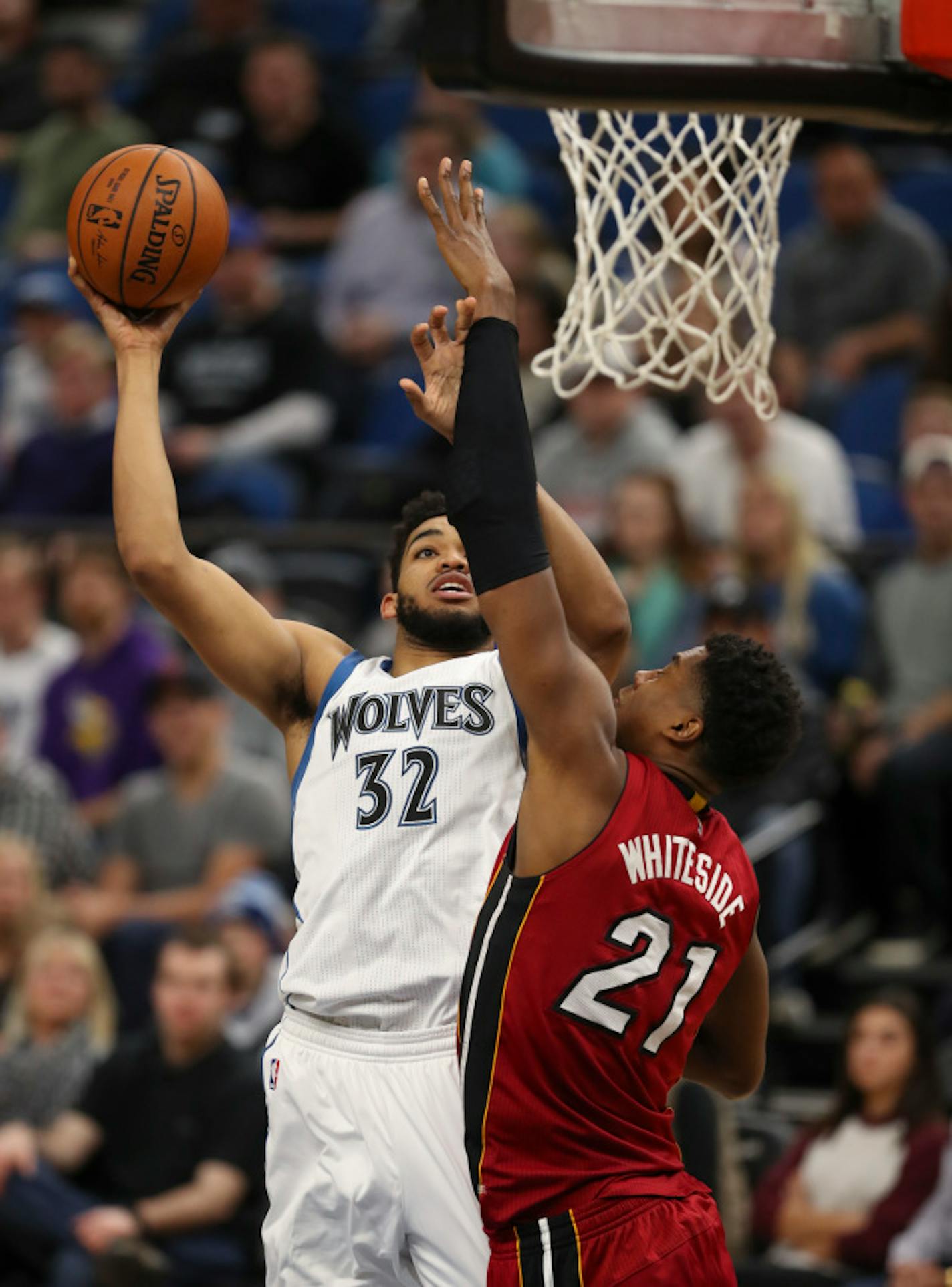 Timberwolves center Karl-Anthony Towns (32) made a fourth quarter shot over Miami Heat center Hassan Whiteside (21) for two of his game high 35 points.    ]  JEFF WHEELER ' jeff.wheeler@startribune.com