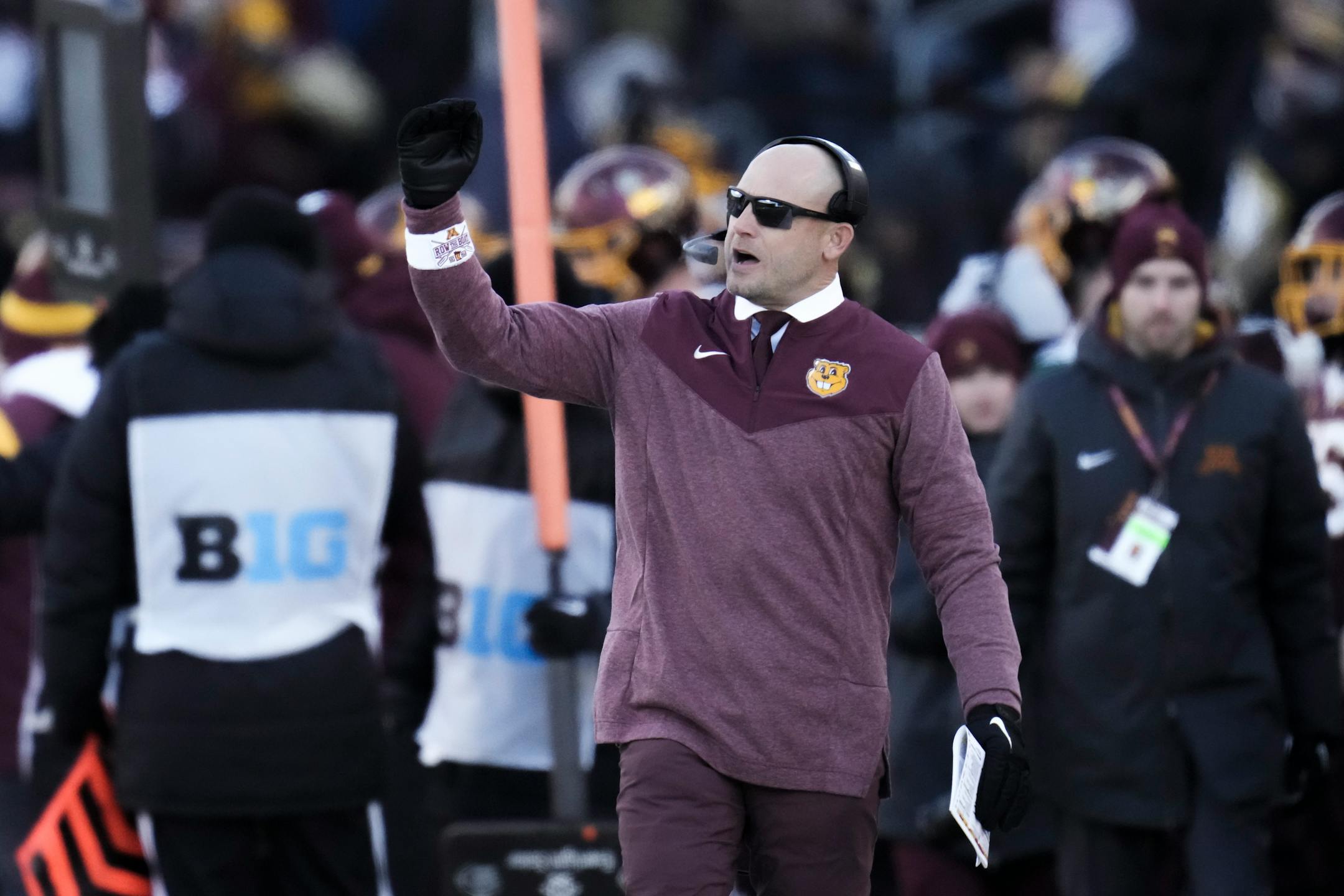 Minnesota Gophers head coach P.J. Fleck walked the sideline during a game against the Iowa Hawkeyes.