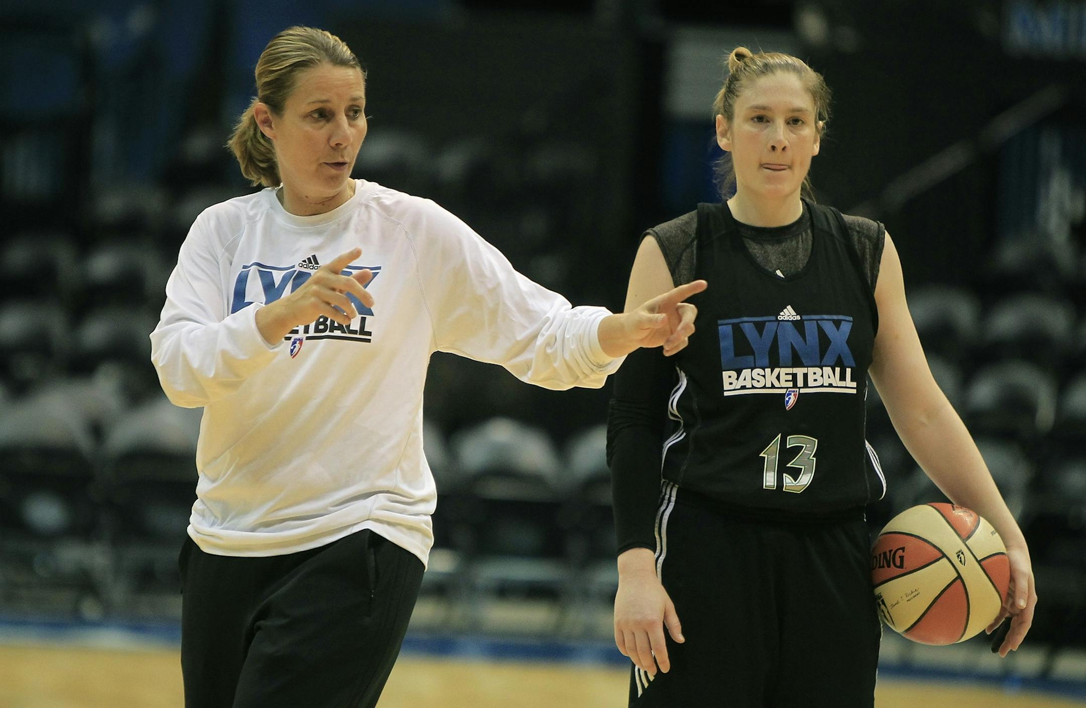 Lindsay Whalen and coach Cheryl Reeve