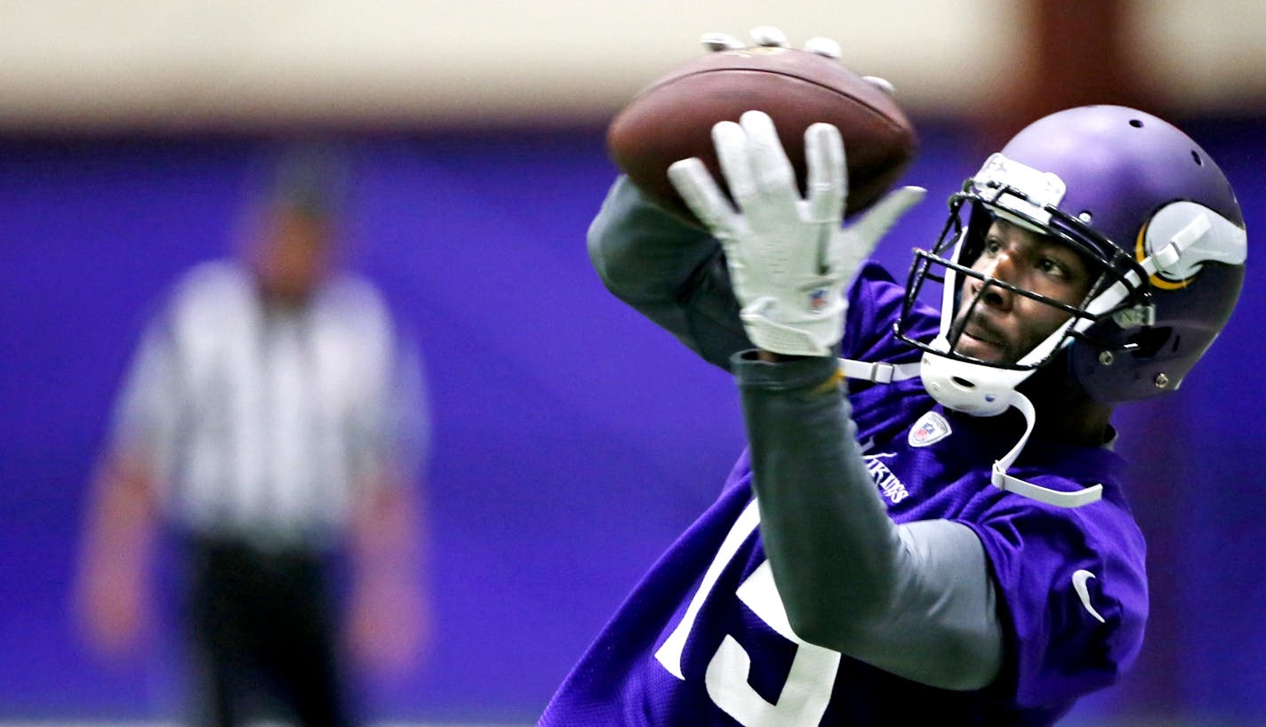 Receiver Greg Jennings pulled down a pass during Minnesota Vikings OTA practice Wednesday June, 5 2013 in Eden Prairie, MN.