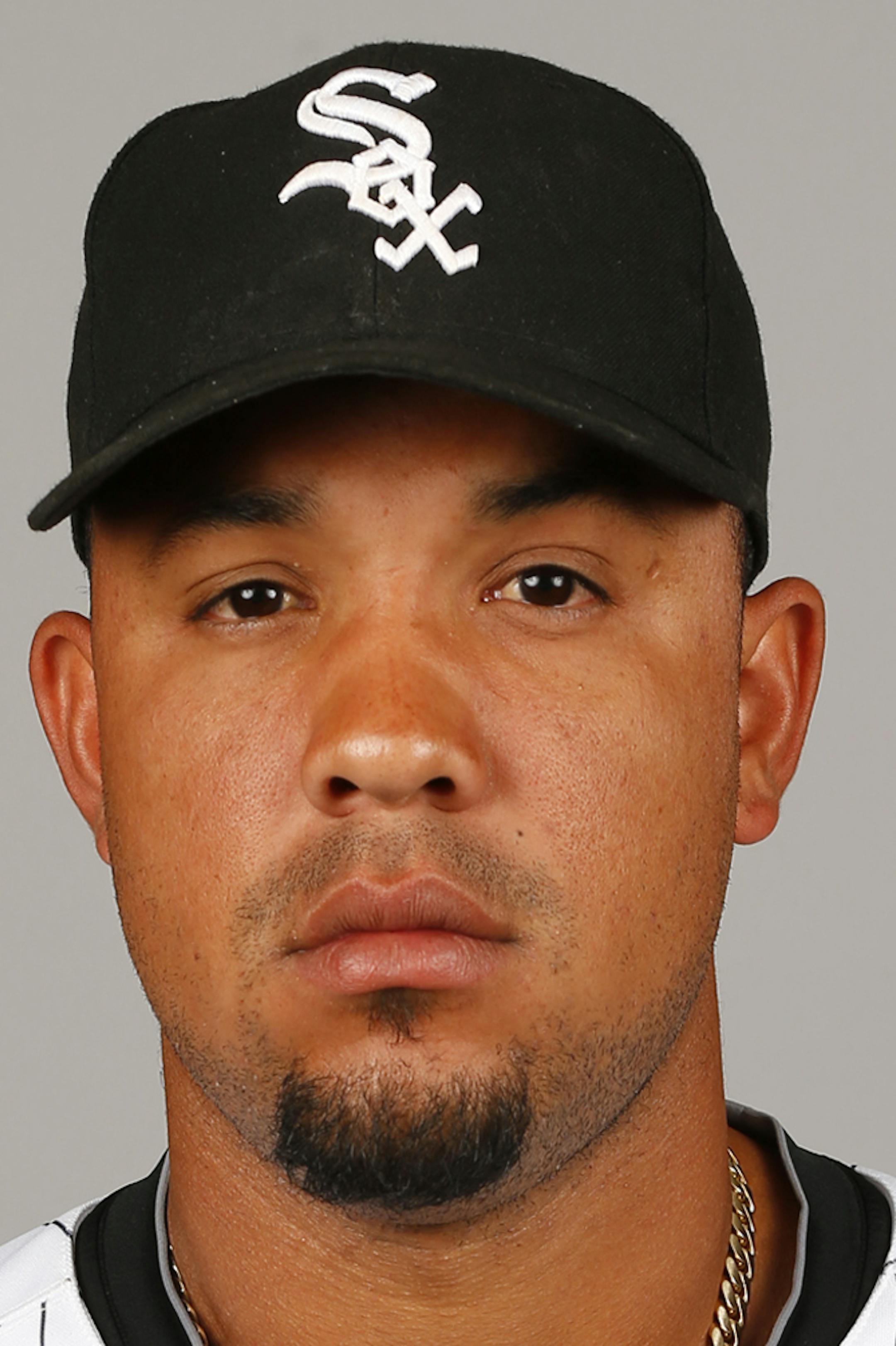 This is a 2014 photo of Jose Abreu of the Chicago White Sox baseball team. This image reflects the 2014 active roster as of Feb. 22, 2014 when this image was taken in Glendale, Ariz. (AP Photo/Paul Sancya) ORG XMIT: AZPS248