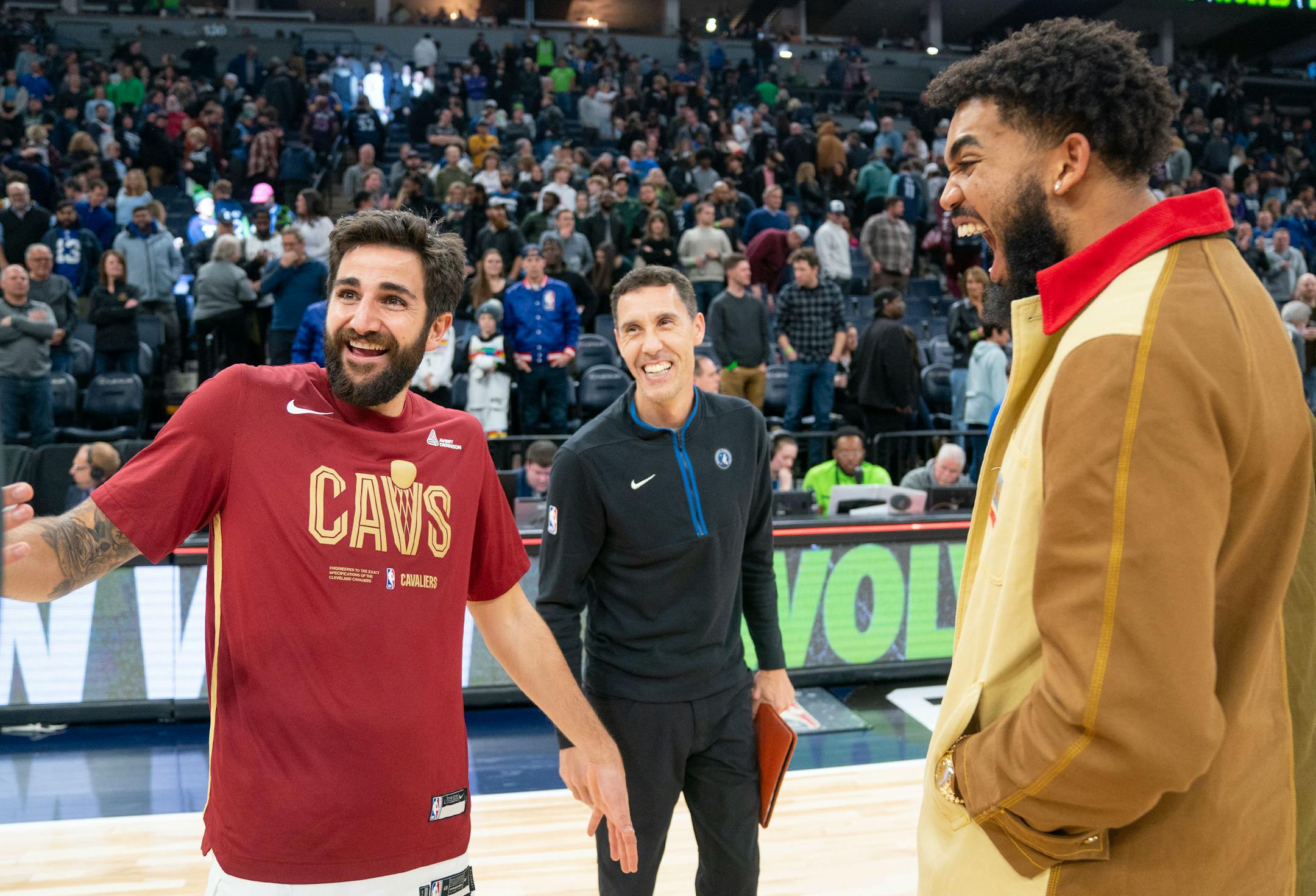 Cleveland Cavaliers guard Ricky Rubio (13) greets Minnesota Timberwolves assistant coach Pablo Prigioni and center Karl-Anthony Towns after their game Saturday, Jan. 14, 2023 at Target Center in Minneapolis. Rubio played for the Timberwolves from 2011-2017 and 2021-2022. ]