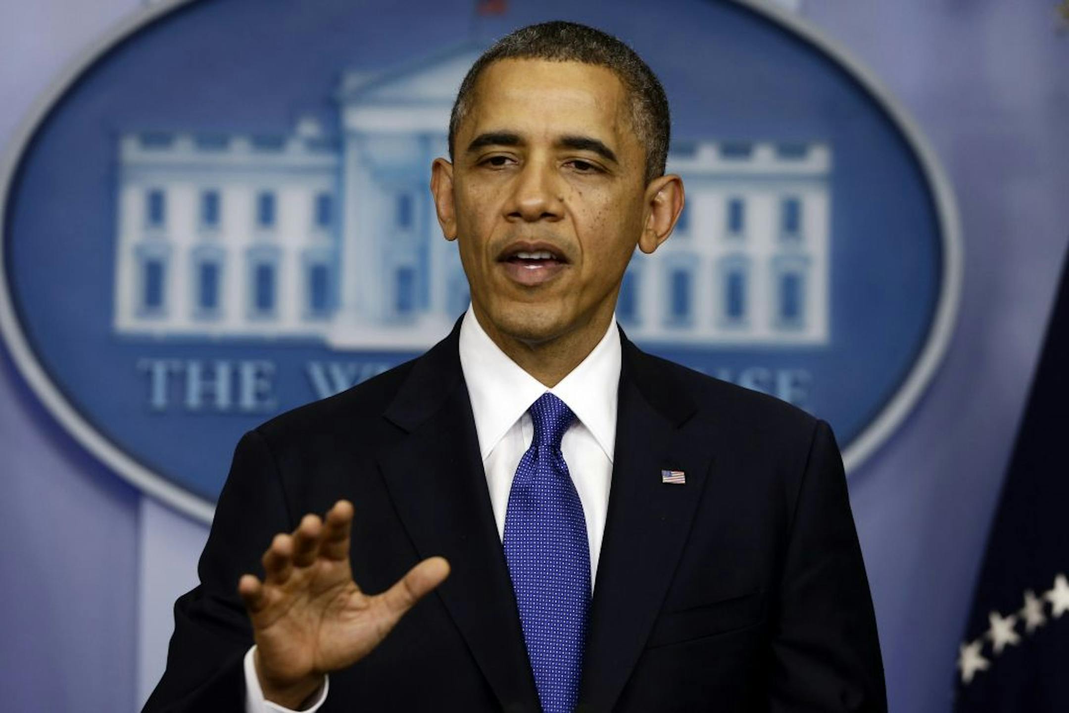 President Barack Obama speaks to reporters about the fiscal cliff in the Brady Press Briefing Room at the White House in Washington, Friday, Dec. 21, 2012.