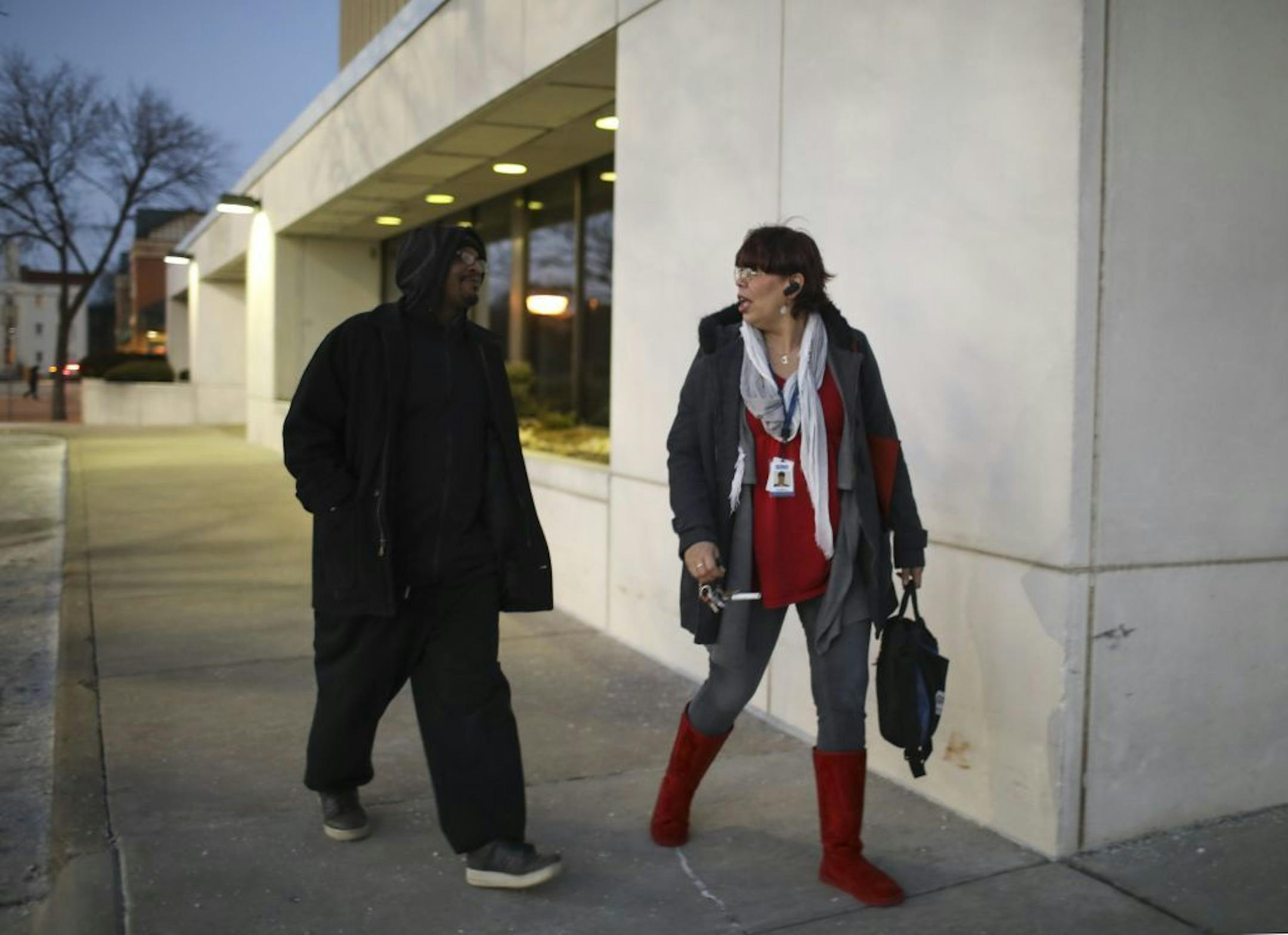 Donzell Varnado and his counselor, Cynthia Jackson leaving the Goodwill-Easter Seals Minnesota office in Uptown. Jackson was going to give Varnado a ride to pick his daughter up and then take them to his house.