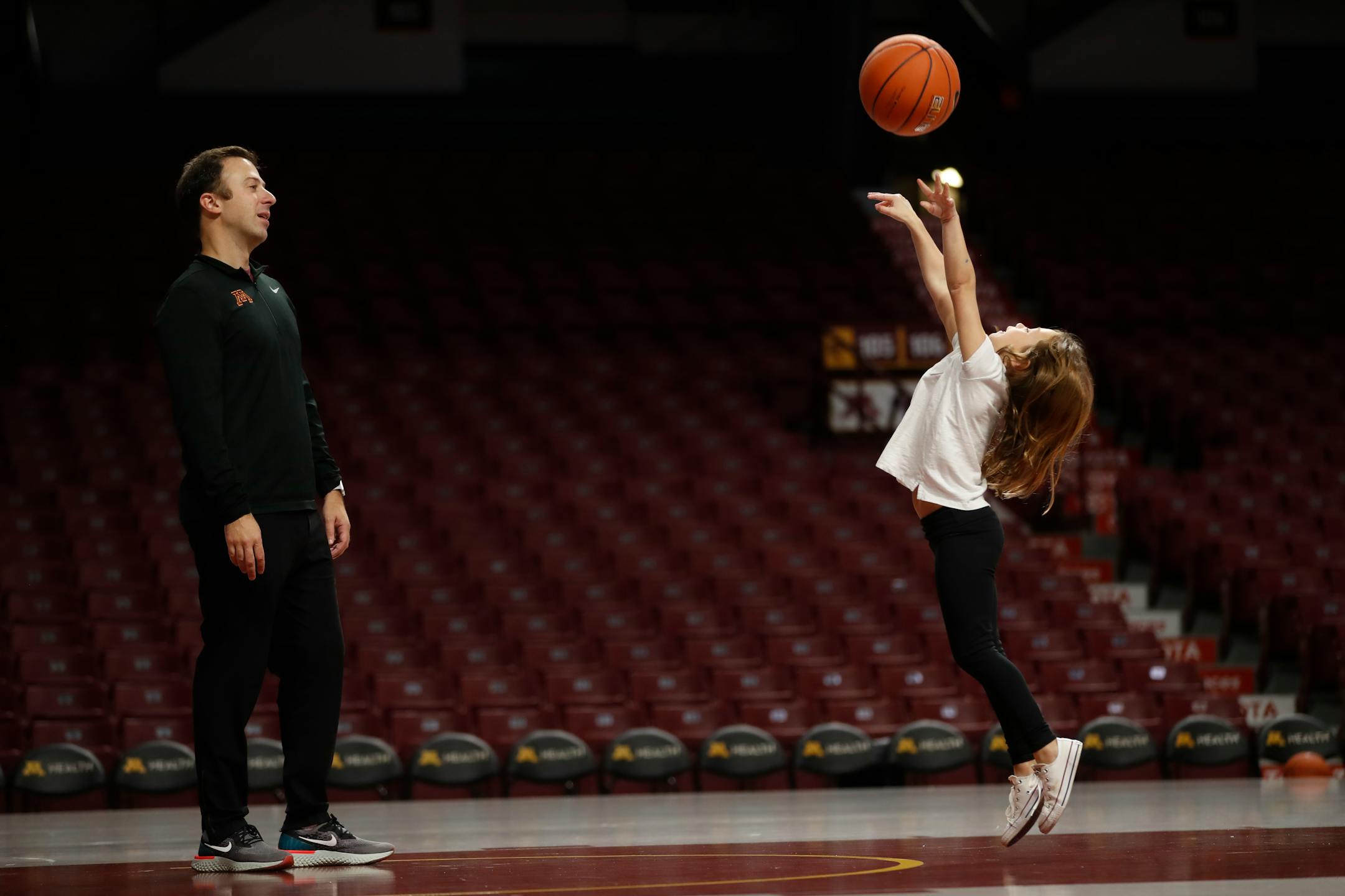 Minnesota Gophers coach Rick Pitino played a little pickup basketball with daughter, Ava, before the start of the scrimmage on October 28, 2018.