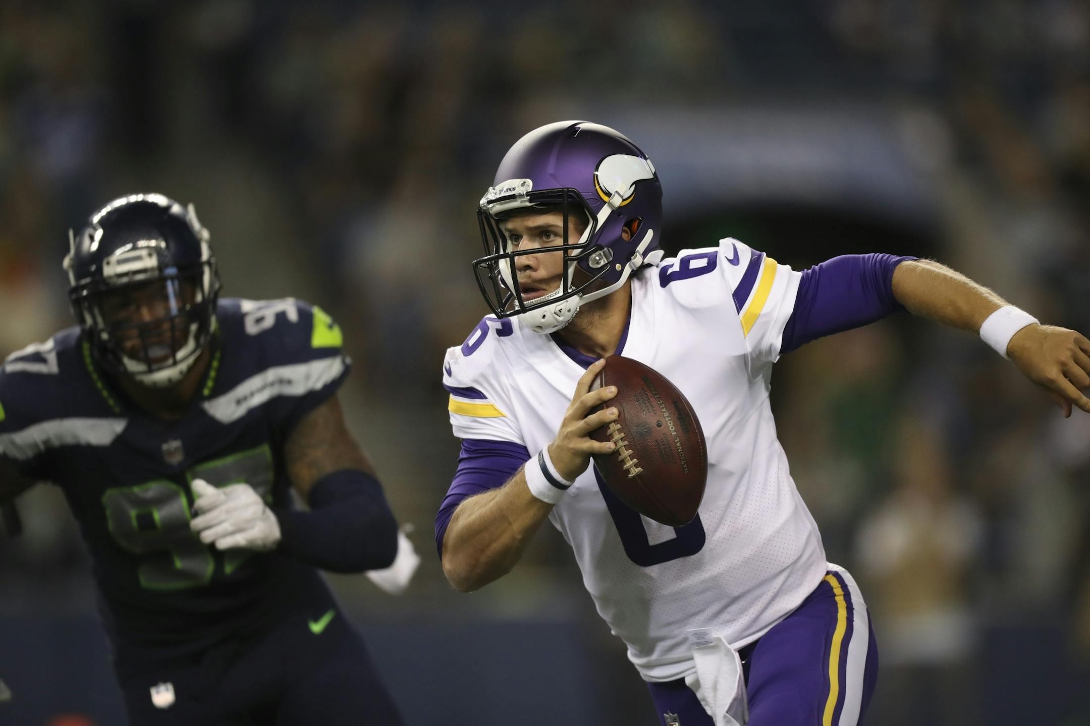 Vikings quarterback Taylor Heinicke (6) picked up a first down with a 12 yard gain in the fourth quarter.