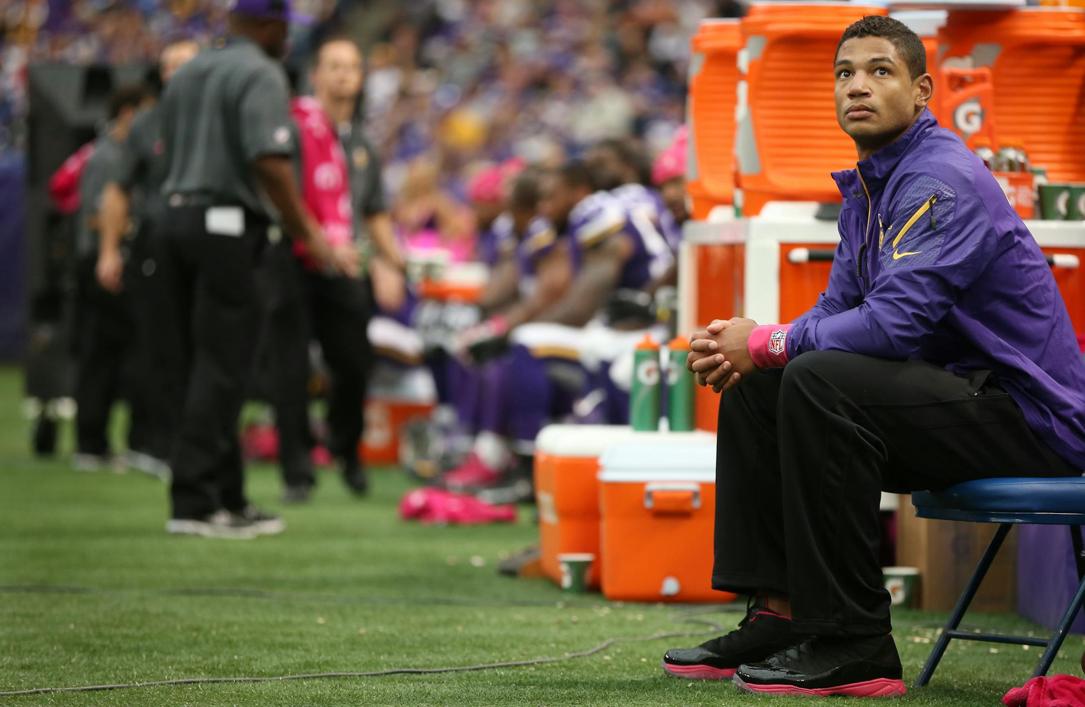 Josh Freeman, top, didn’t have anything to do with the Vikings’ 35-10 loss to the Panthers on Sunday, but he could be named the new starting quarterback as soon as Wednesday. He’s getting a crash course on the playbook from offensive coaches. Other problem areas leading to the Vikings’ 1-4 record include the team’s once-sturdy run defense, left, and some inconsistent blocking in front of Adrian Peterson, right.