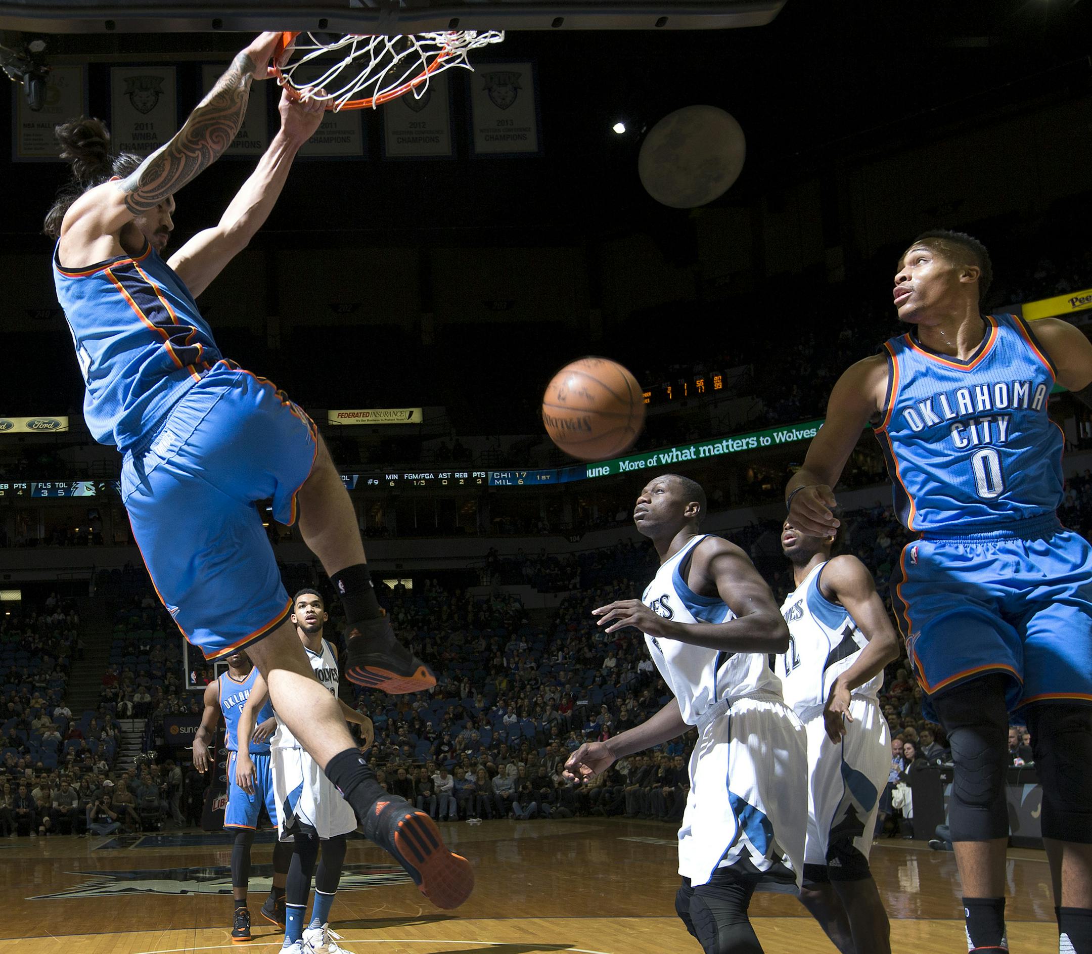 Steven Adams (12) dunked the ball in the first half. Oklahoma City beat Minnesota by final score of 101-96. ] CARLOS GONZALEZ &#xef; cgonzalez@startribune.com - January 12, 2016, Minneapolis, MN, Target Center, NBA, Minnesota Timberwolves vs. Oklahoma City Thunder