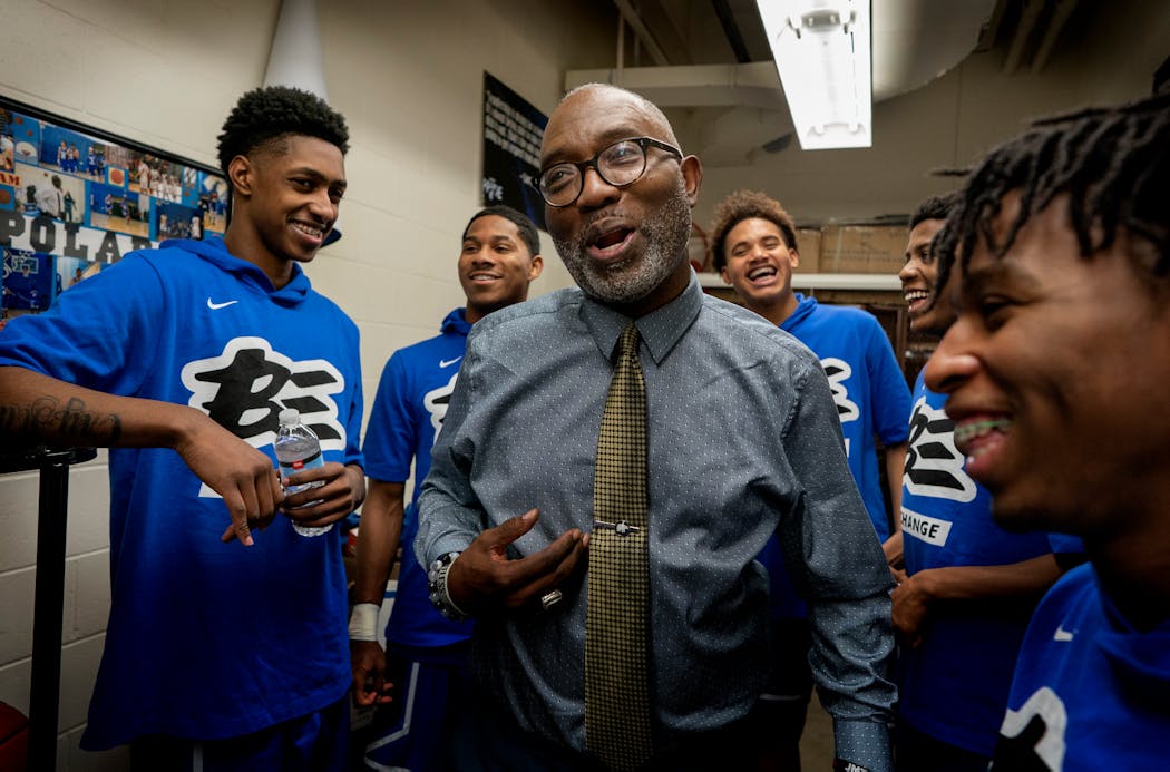 Now-retired North High coach Larry McKenzie interacted with his players before a game in this photo from 2019.
