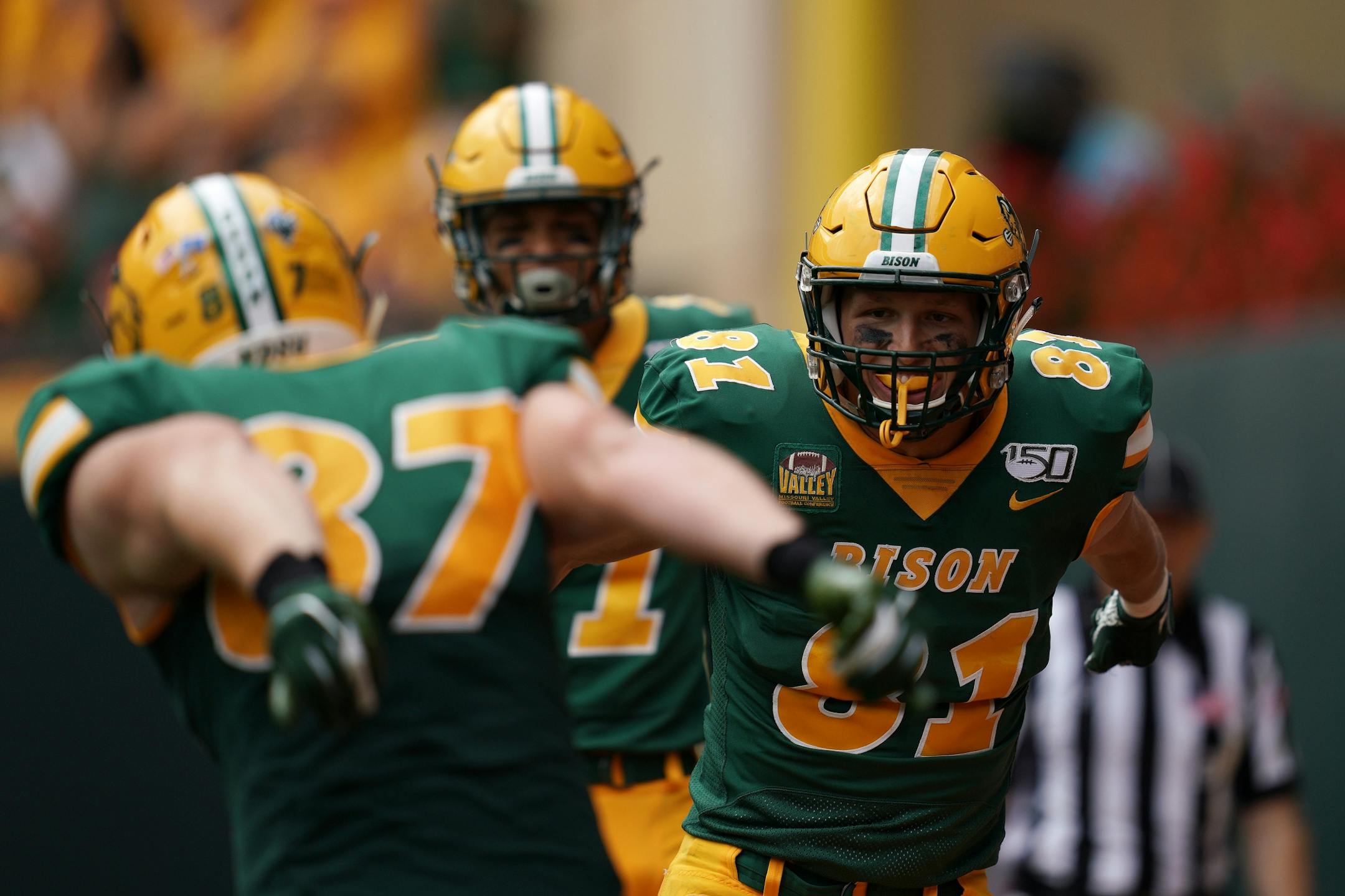North Dakota State Bison tight end Josh Babicz (81) celebrated with his teammates after he caught a touchdown pass in the first half.