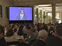 Past fiction winner Marlon James announces the 2016 fiction winner, Charles Baxter, at the Minnesota Book Awards.