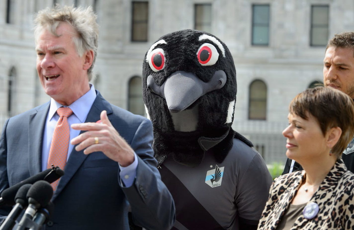 St. Paul Mayor Chris Coleman, team mascot PK the Loon, Senate President Sandra Pappas and team captain Aaron Pitchkolan.