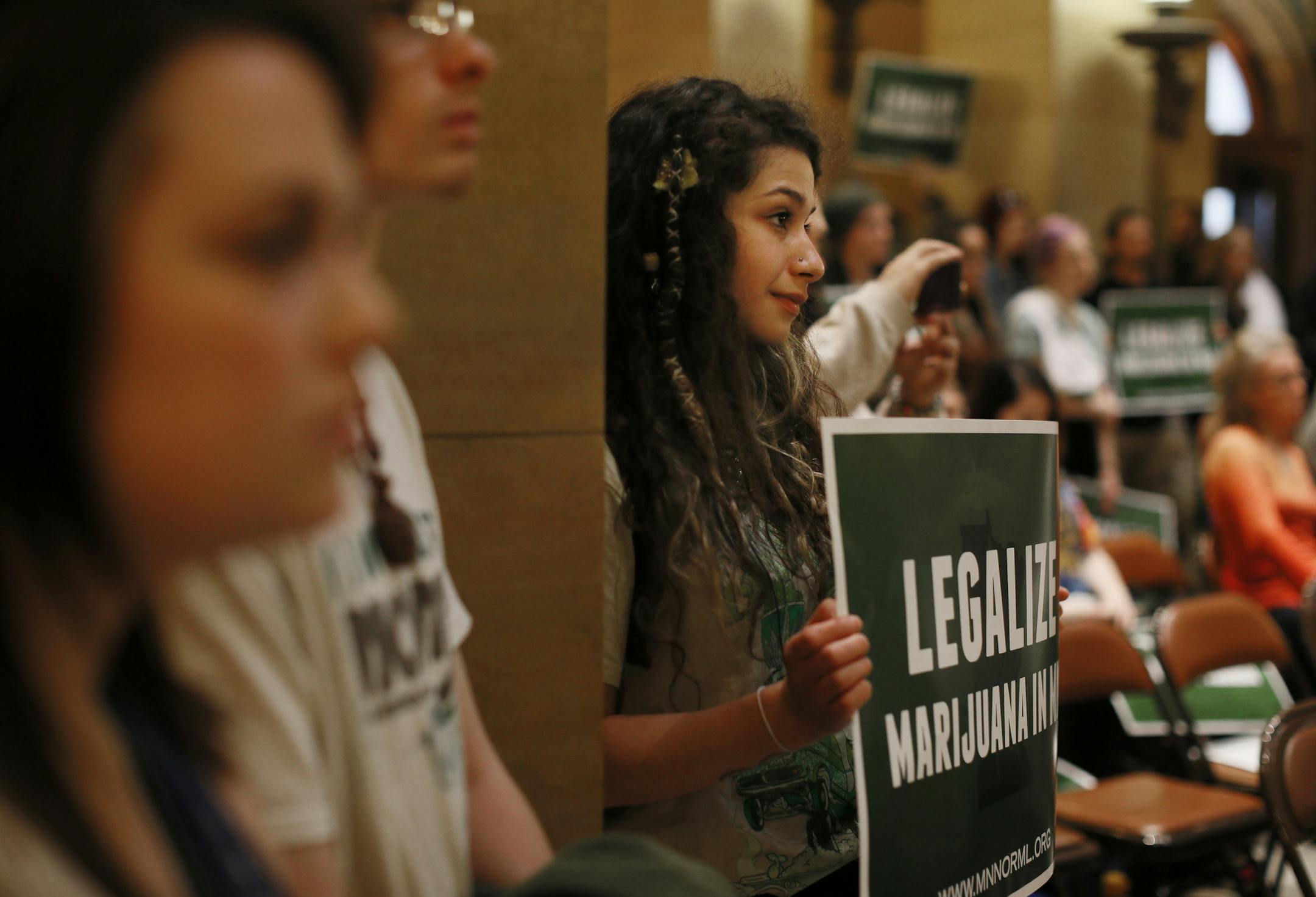 Allyssa Zuniga of Cottage Grover attended a rally at the Minnesota State Capitol Rotunda was held by members of Minnesota Normal, for the legalization of cannabis Wednesday April 23 , 2014 in St. Paul, MN. ] JERRY HOLT jerry.holt@startribune.com