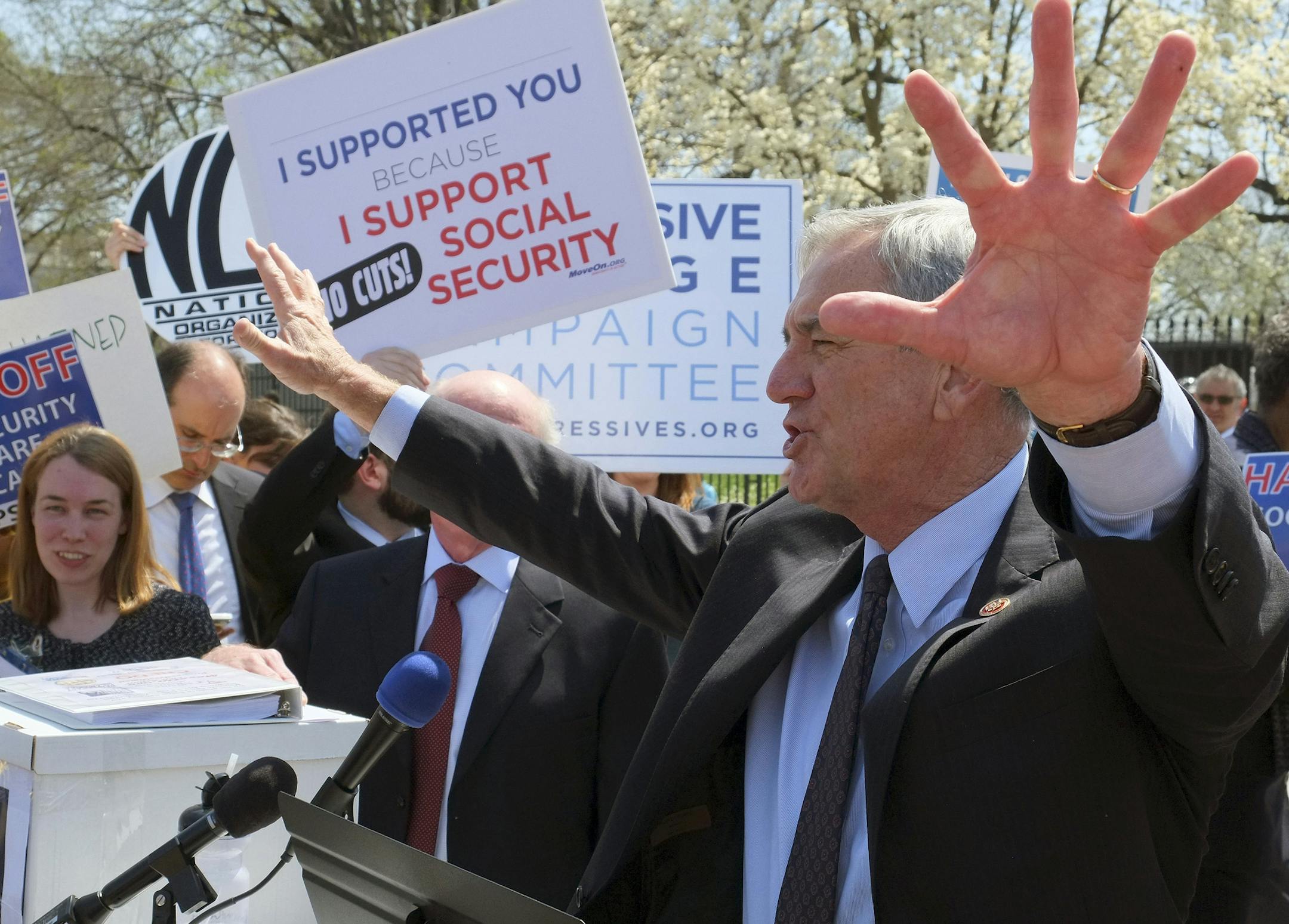 Rep. Rick Nolan, D-Minn. gestures as he speaks to a group of protesters outside of the White House in Washington, Tuesday, Apr. 9, 2013. Liberal lawmakers from both chambers of Congress and a coalition of like-minded groups rallied outside the White House, voicing frustration at the Democratic president they feel has let them down by proposing cuts to Medicare and Social Security. (AP Photo/J. David Ake)