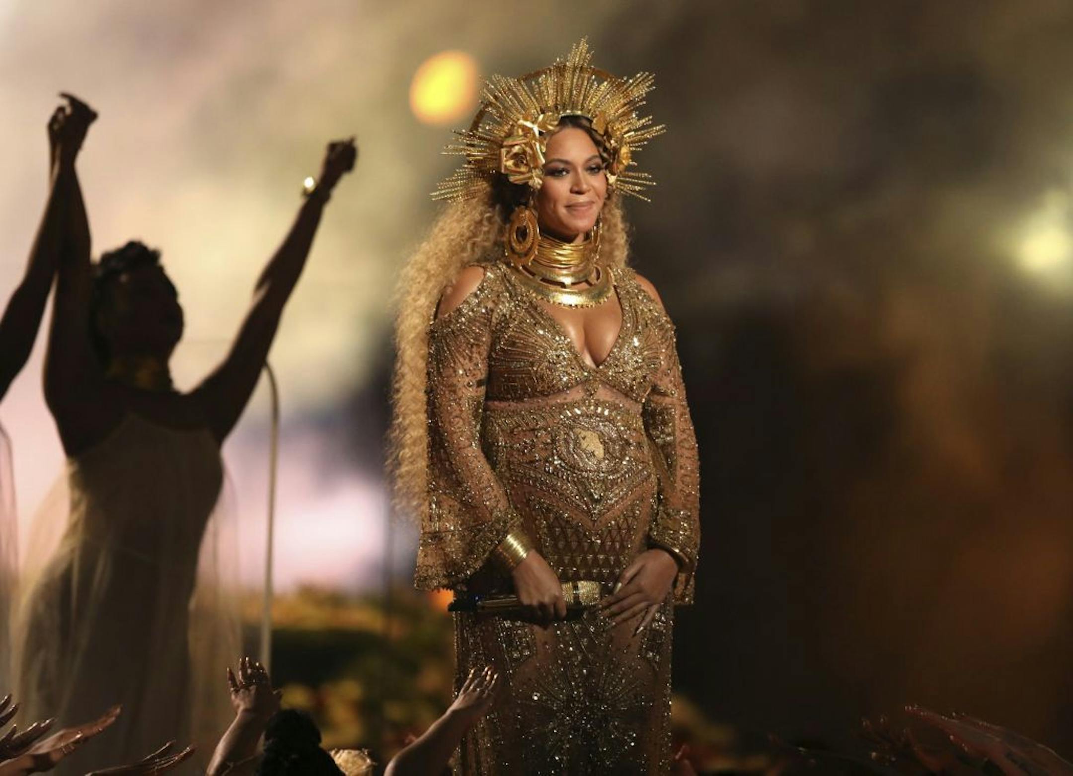 FILE - This Feb. 12, 2017, file photo shows Beyonce performing at the 59th annual Grammy Awards in Los Angeles. Beyonce and Jay Z celebrated the impending birth of their twins with a "push party" on May 20, 2017.