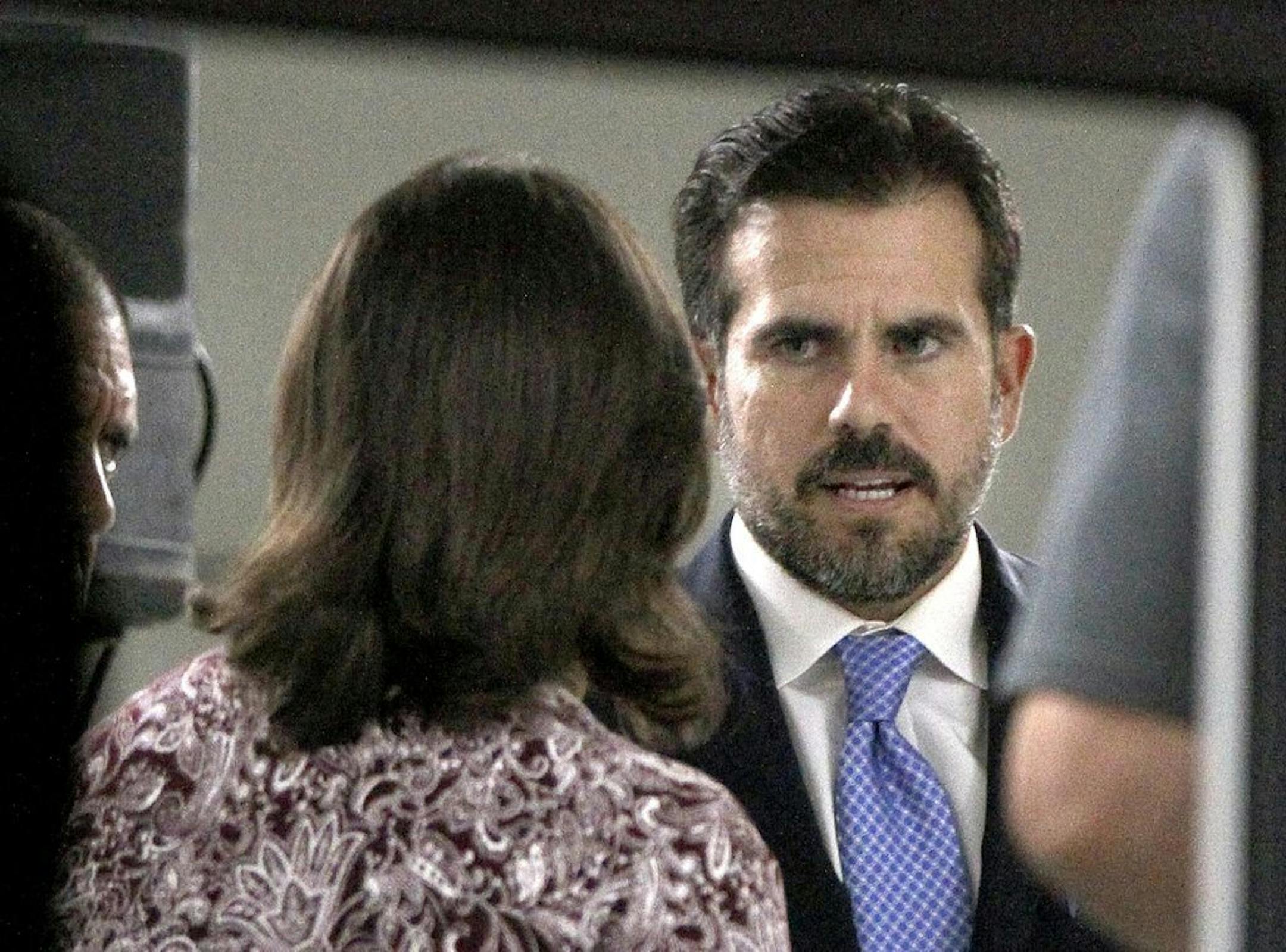 Puerto Rico Gov. Ricardo Rossello meets with mayors from his party inside the Yolanda Guerrero Cultural Center in Guaynabo, Puerto Rico, Sunday, July 21, 2019. The meeting was closed to the media as he entered through a heavily guarded side door. Rossello said Sunday evening that he will not resign in the face of public furor over an obscenity-laced leaked online chat, but he will not seek re-election or continue as head of his pro-statehood political party.