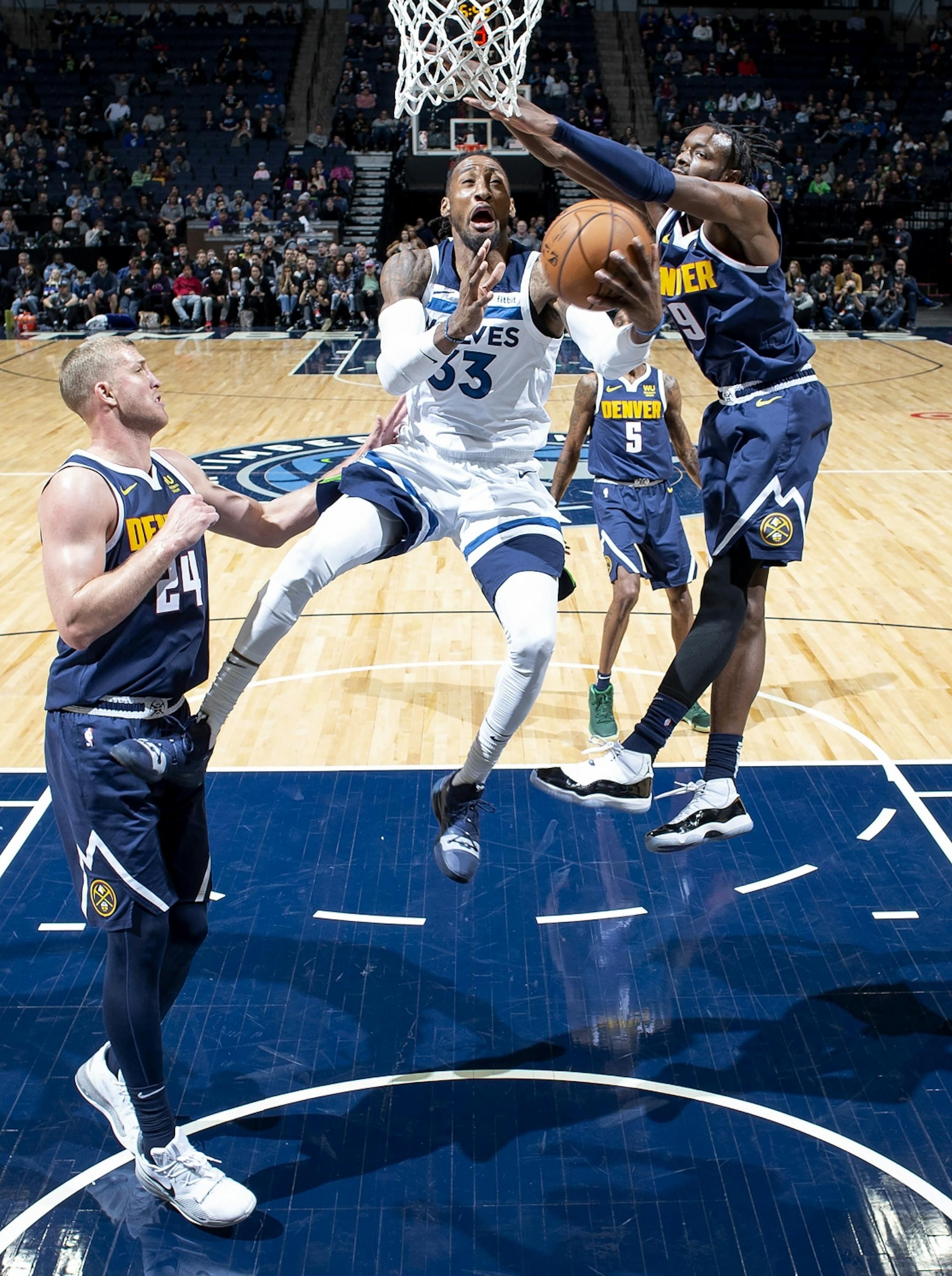 Robert Covington (33) ) of Minnesota Timberwolves attempted a shot in the second half.