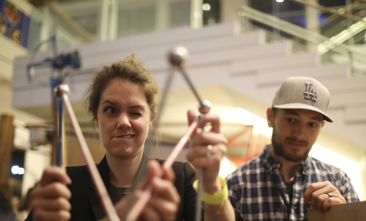 Molly Weismantel, an architect, worked with a friend who was an engineer to construct the tallest tower they could out of the materials available, while her husband, Jared, right, observed. The group of friends were at the adults-only night at the Science Museum. ] JEFF WHEELER &#xef; jeff.wheeler@startribune.com The Science Museum of Minnesota hosted one of their adults-only nights, which they called Social Science: Play. Tinker. Make., Thursday evening, April 6, 2017 in St. Paul. The theme thi