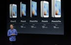 Greg Joswiak, vice president of iOS, iPad and iPhone product marketing, announces the new iPhone SE at Apple headquarters Monday, March 21, 2016, in C
