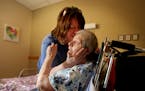 In this moment in 2017, Lisa Papp-Richards comforted her mother, Mary Ann Papp, 77, at a nursing home in Bemidji. Papp-Richards said the facility reta