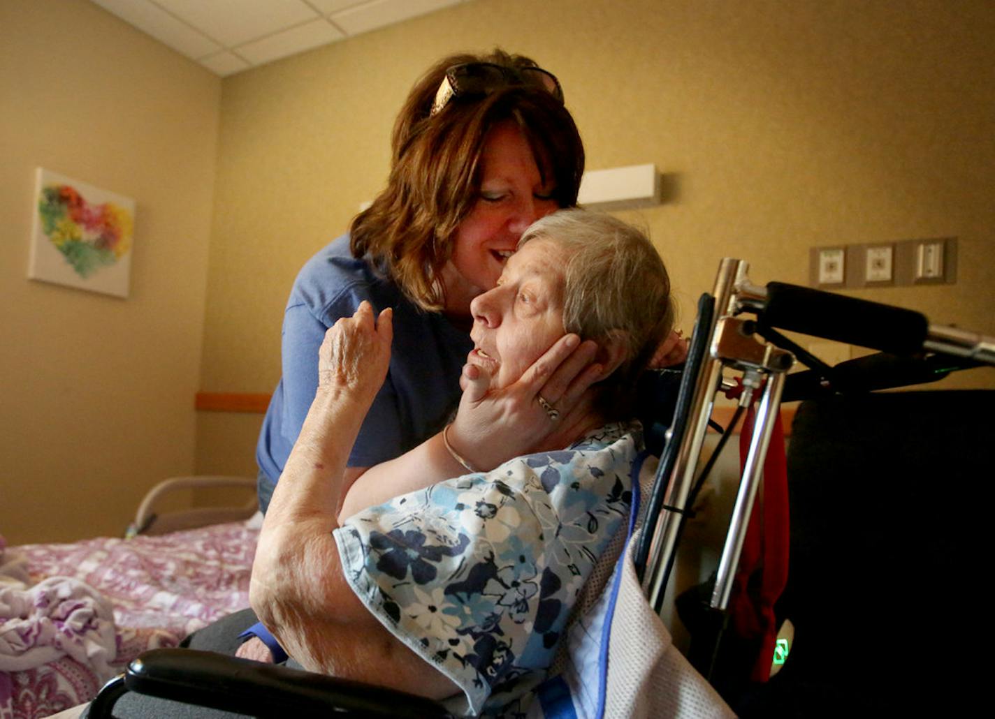 In this moment in 2017, Lisa Papp-Richards comforted her mother, Mary Ann Papp, 77, at a nursing home in Bemidji. Papp-Richards said the facility retaliated against her mother after she attempted to install a small camera to monitor her care.