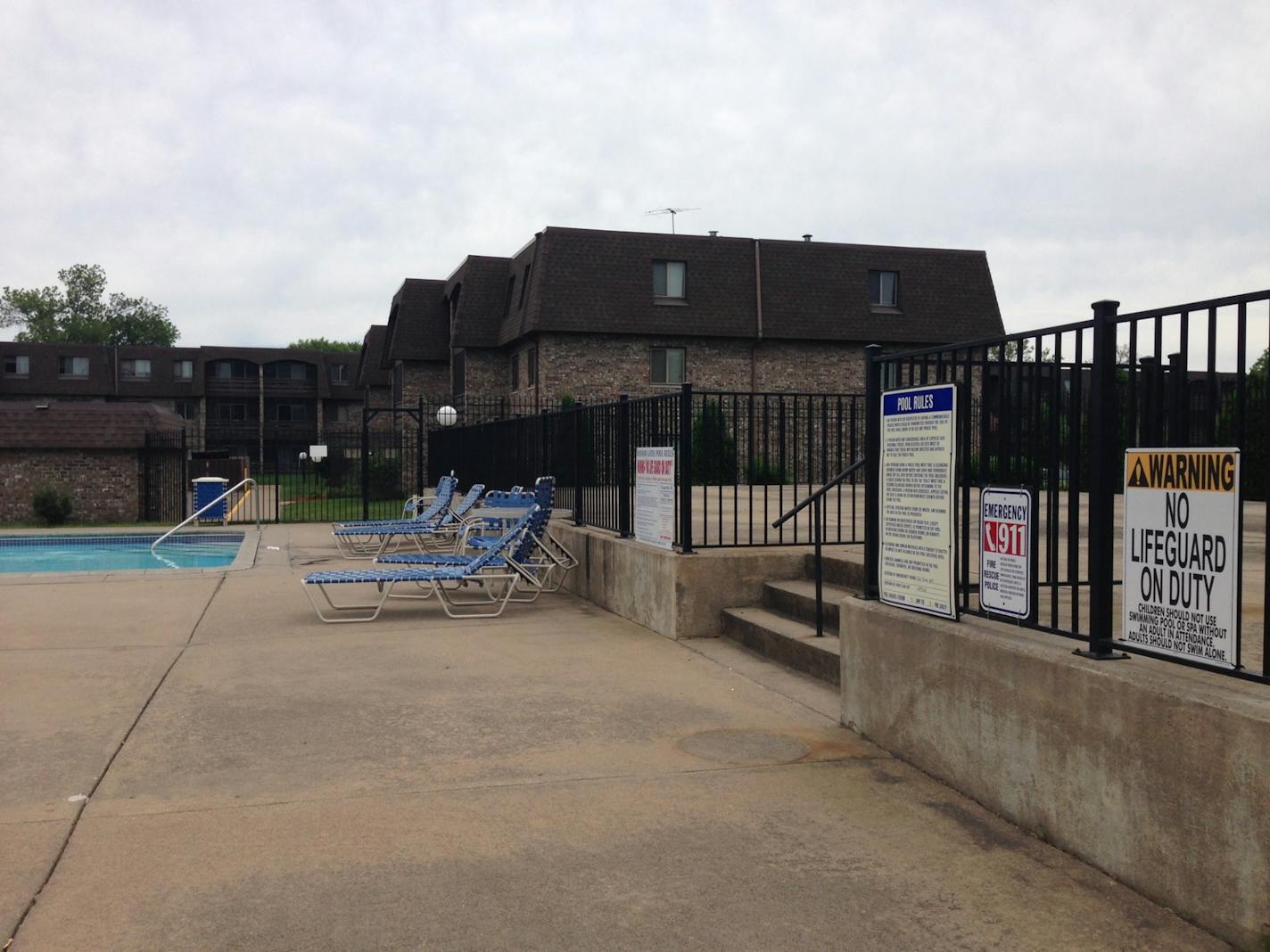 The exterior of the Brooklyn Park apartment pool, where a 3-year-old was found dead.