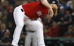 Boston Red Sox relief pitcher Craig Kimbrel throws against the New York Yankees during the eighth inning of Game 1 of a baseball American League Divis