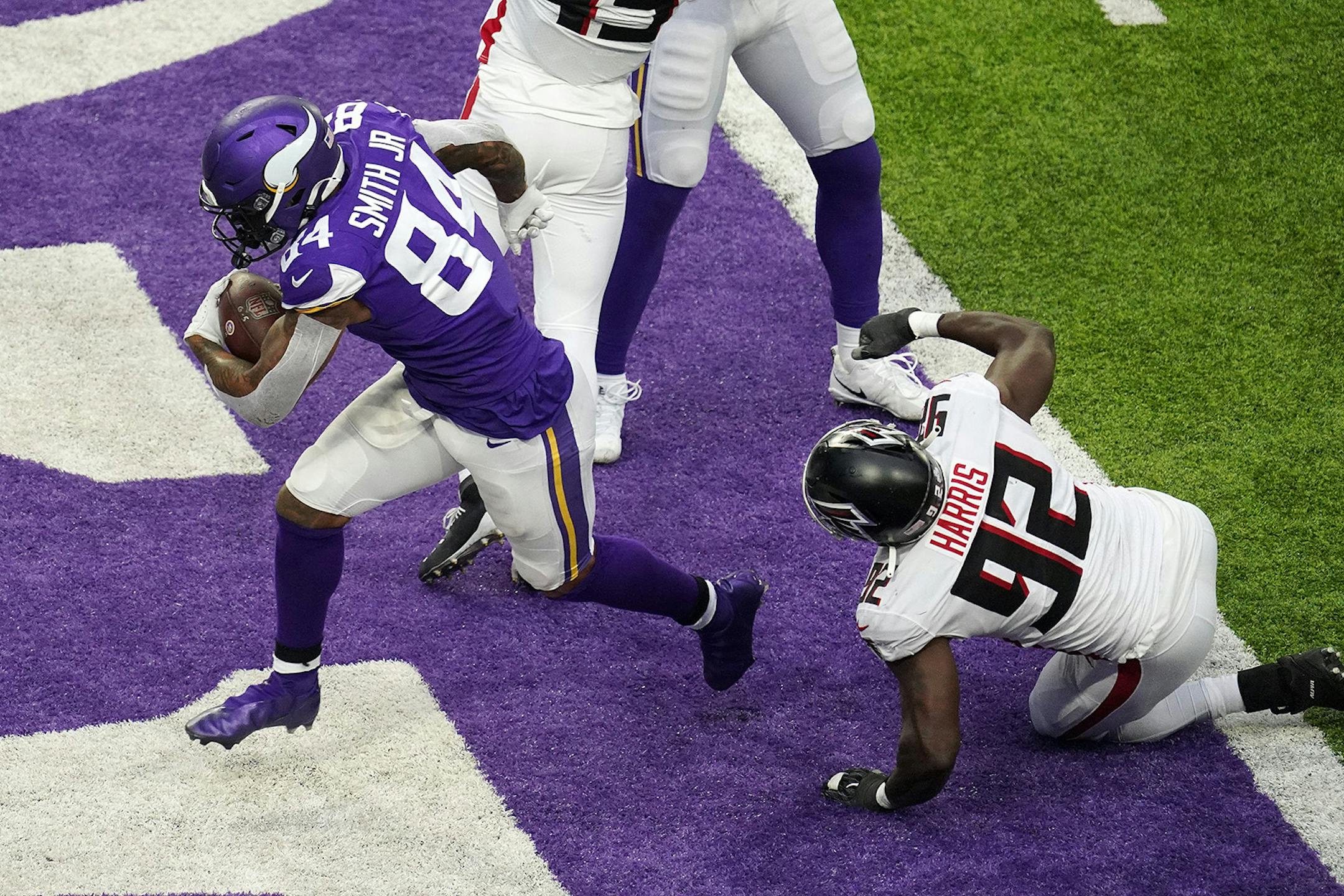 Minnesota Vikings tight end Irv Smith (84) ran the ball in for a two point conversion following a touchdown by Minnesota Vikings wide receiver Adam Thielen (19) in the fourth quarter.