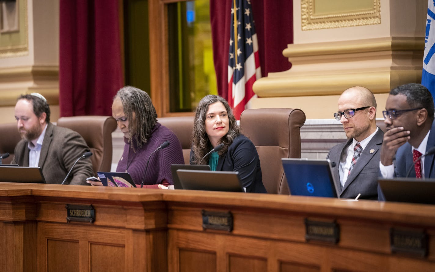 Five council members — including Council President Lisa Bender, middle — are working to change city charter language that sets a minimum size requirement for the department.