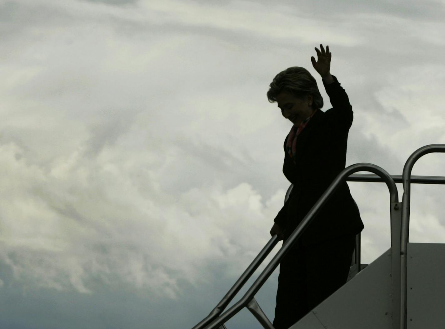 Democratic presidential hopeful Sen. Hillary Rodham Clinton, D-N.Y., waves as she makes her way from her campaign plane in Sioux Falls, S.D., Monday, June 2, 2008. (AP Photo/Elise Amendola) ORG XMIT: MIN2016052117212016