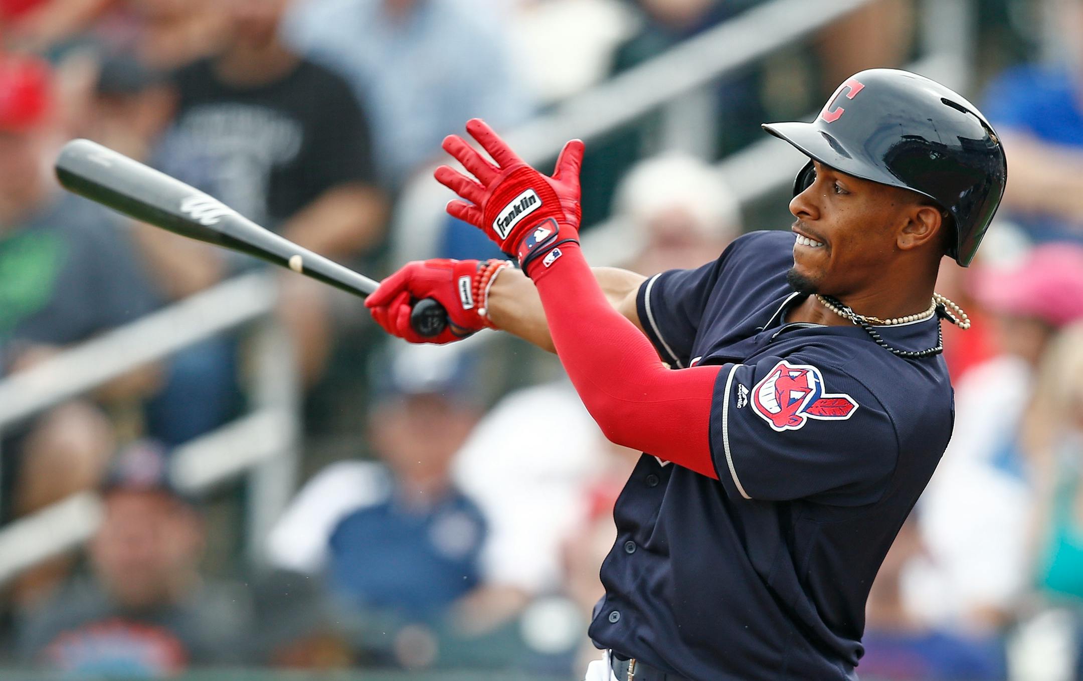 Cleveland Indians shortstop Francisco Lindor takes a swing during the first inning of a spring training baseball game against the Colorado Rockies Friday, March 3, 2017, in Goodyear, Ariz. The Rockies defeated the Indians 16-7. (AP Photo/Ross D. Franklin)