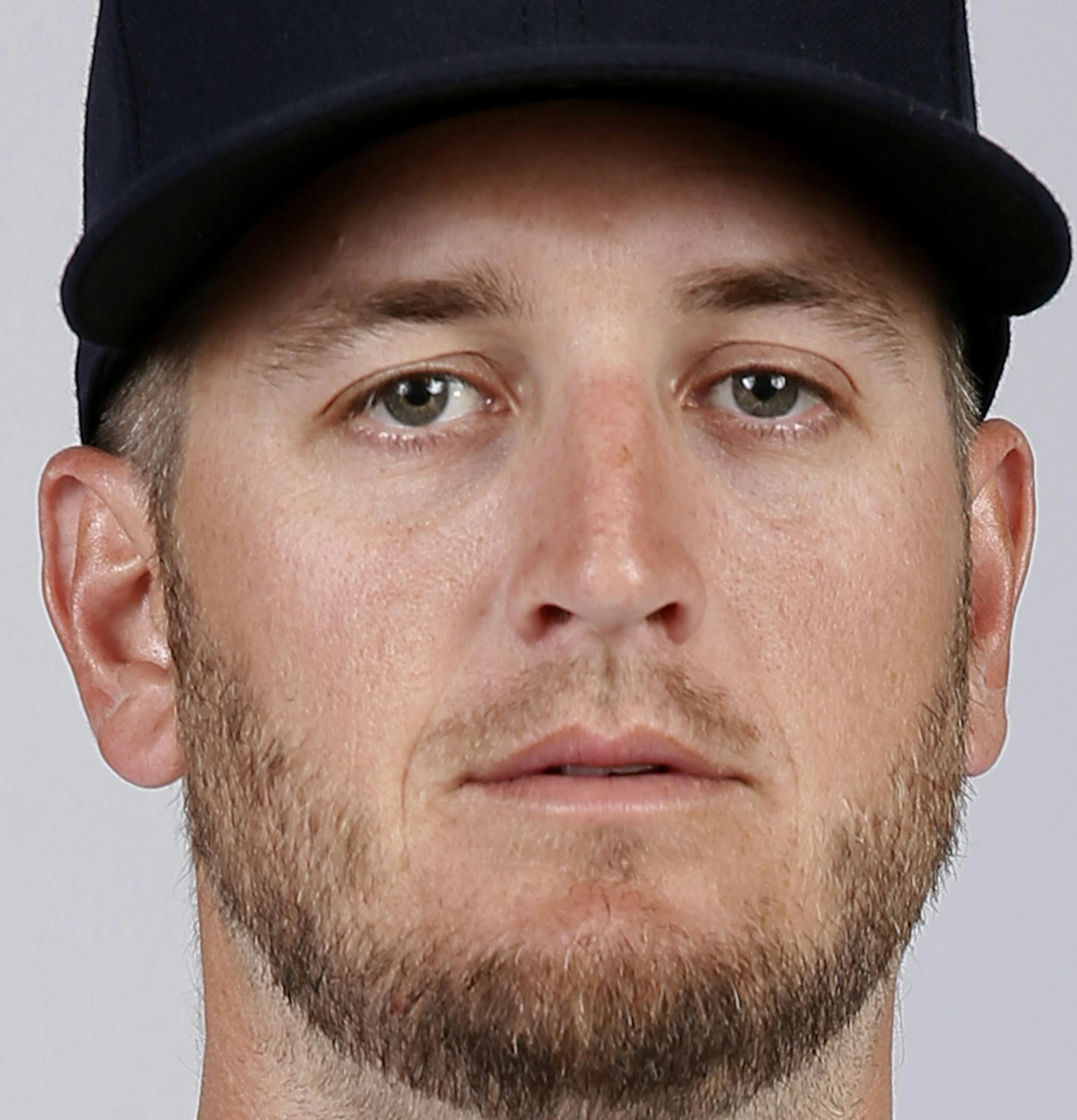 This is a 2015 photo of Glen Perkins of the Minnesota Twins baseball team. This image reflects the Twins active roster as of Tuesday March 3, 2015, when this image was taken. (AP Photo/Tony Gutierrez) ORG XMIT: FLTG279