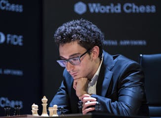 American chess Grandmaster Fabiano Caruana concentrates during a match against Azerbajan's Shakhriyar Mamedyarov.