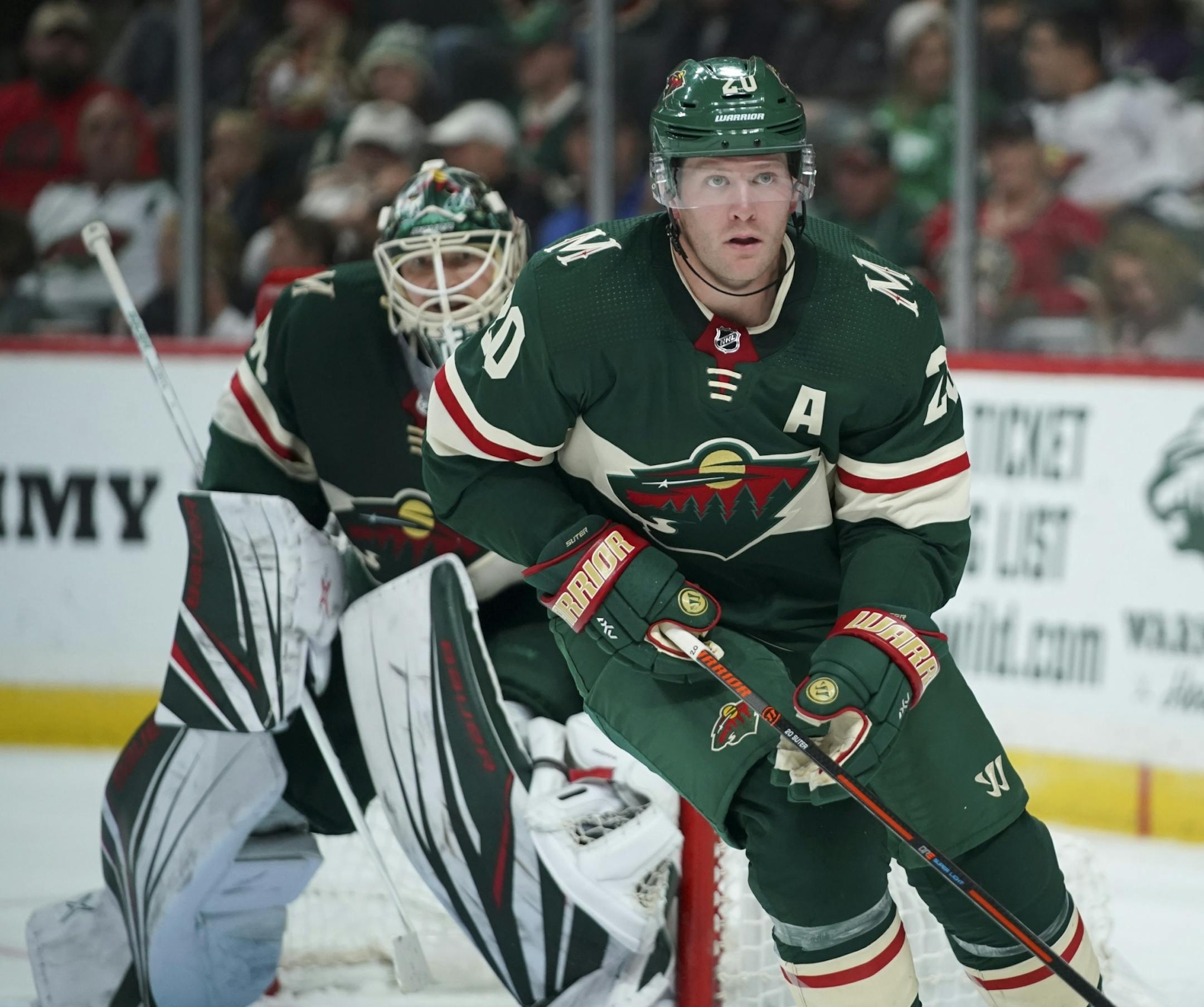Minnesota Wild defenseman Ryan Suter (20) tracked the play from in front of Minnesota Wild goaltender Devan Dubnyk in the second period.
